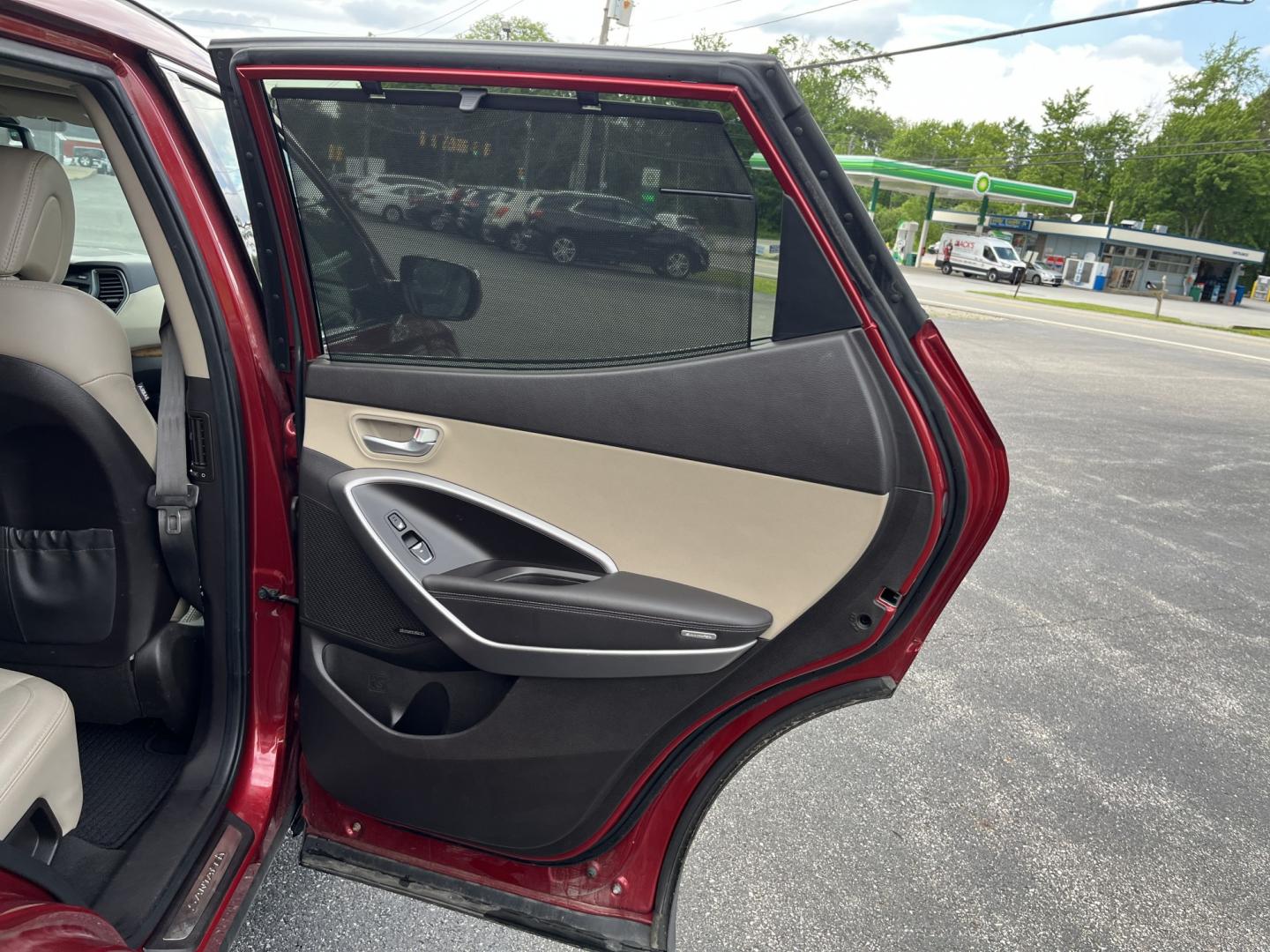 2016 Red /Beige Hyundai Santa Fe Sport 2.4 AWD (5XYZUDLB6GG) with an 2.4L I4 DOHC 16V engine, Automatic transmission, located at 547 E. Main St., Orwell, OH, 44076, (440) 437-5893, 41.535435, -80.847855 - 2016 Hyundai Santa Fe Sport Popular AWD – Loaded with Leather, Luxury Features, and All-Weather Capability! This 2016 Hyundai Santa Fe Sport Popular AWD is a well-equipped midsize SUV that offers the perfect blend of comfort, technology, and confident performance. Powered by a smooth 2.4L GDI I4- Photo#31
