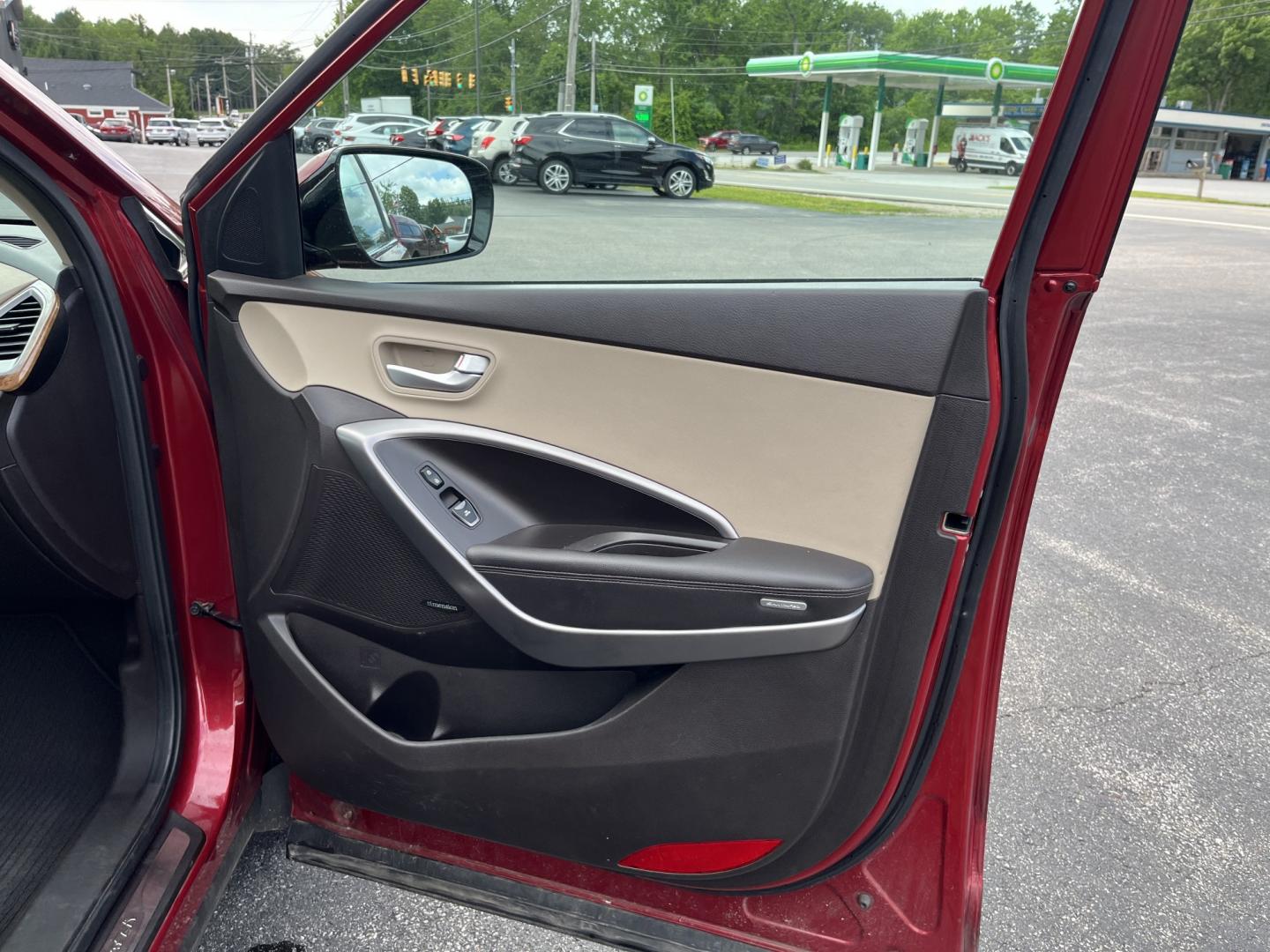 2016 Red /Beige Hyundai Santa Fe Sport 2.4 AWD (5XYZUDLB6GG) with an 2.4L I4 DOHC 16V engine, Automatic transmission, located at 547 E. Main St., Orwell, OH, 44076, (440) 437-5893, 41.535435, -80.847855 - 2016 Hyundai Santa Fe Sport Popular AWD – Loaded with Leather, Luxury Features, and All-Weather Capability! This 2016 Hyundai Santa Fe Sport Popular AWD is a well-equipped midsize SUV that offers the perfect blend of comfort, technology, and confident performance. Powered by a smooth 2.4L GDI I4- Photo#33