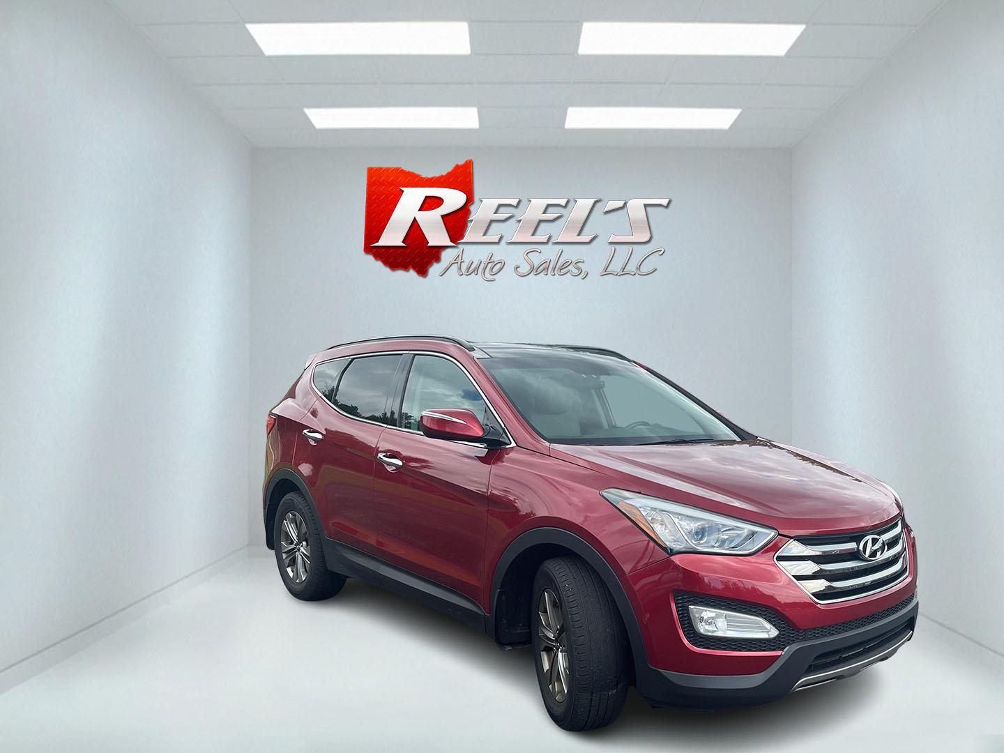2016 Red /Beige Hyundai Santa Fe Sport 2.4 AWD (5XYZUDLB6GG) with an 2.4L I4 DOHC 16V engine, Automatic transmission, located at 547 E. Main St., Orwell, OH, 44076, (440) 437-5893, 41.535435, -80.847855 - 2016 Hyundai Santa Fe Sport Popular AWD – Loaded with Leather, Luxury Features, and All-Weather Capability! This 2016 Hyundai Santa Fe Sport Popular AWD is a well-equipped midsize SUV that offers the perfect blend of comfort, technology, and confident performance. Powered by a smooth 2.4L GDI I4- Photo#2