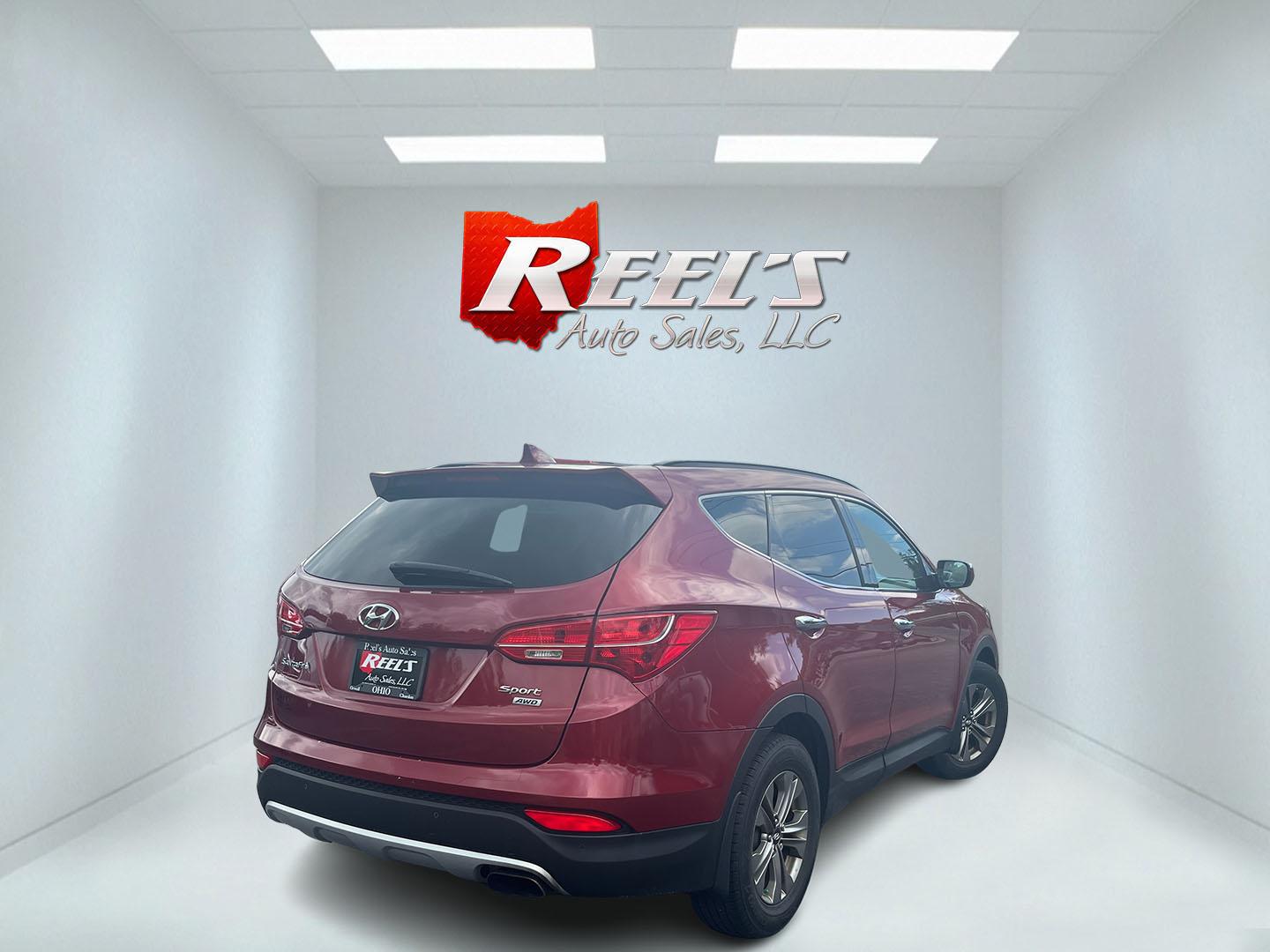 2016 Red /Beige Hyundai Santa Fe Sport 2.4 AWD (5XYZUDLB6GG) with an 2.4L I4 DOHC 16V engine, Automatic transmission, located at 547 E. Main St., Orwell, OH, 44076, (440) 437-5893, 41.535435, -80.847855 - 2016 Hyundai Santa Fe Sport Popular AWD – Loaded with Leather, Luxury Features, and All-Weather Capability! This 2016 Hyundai Santa Fe Sport Popular AWD is a well-equipped midsize SUV that offers the perfect blend of comfort, technology, and confident performance. Powered by a smooth 2.4L GDI I4- Photo#6
