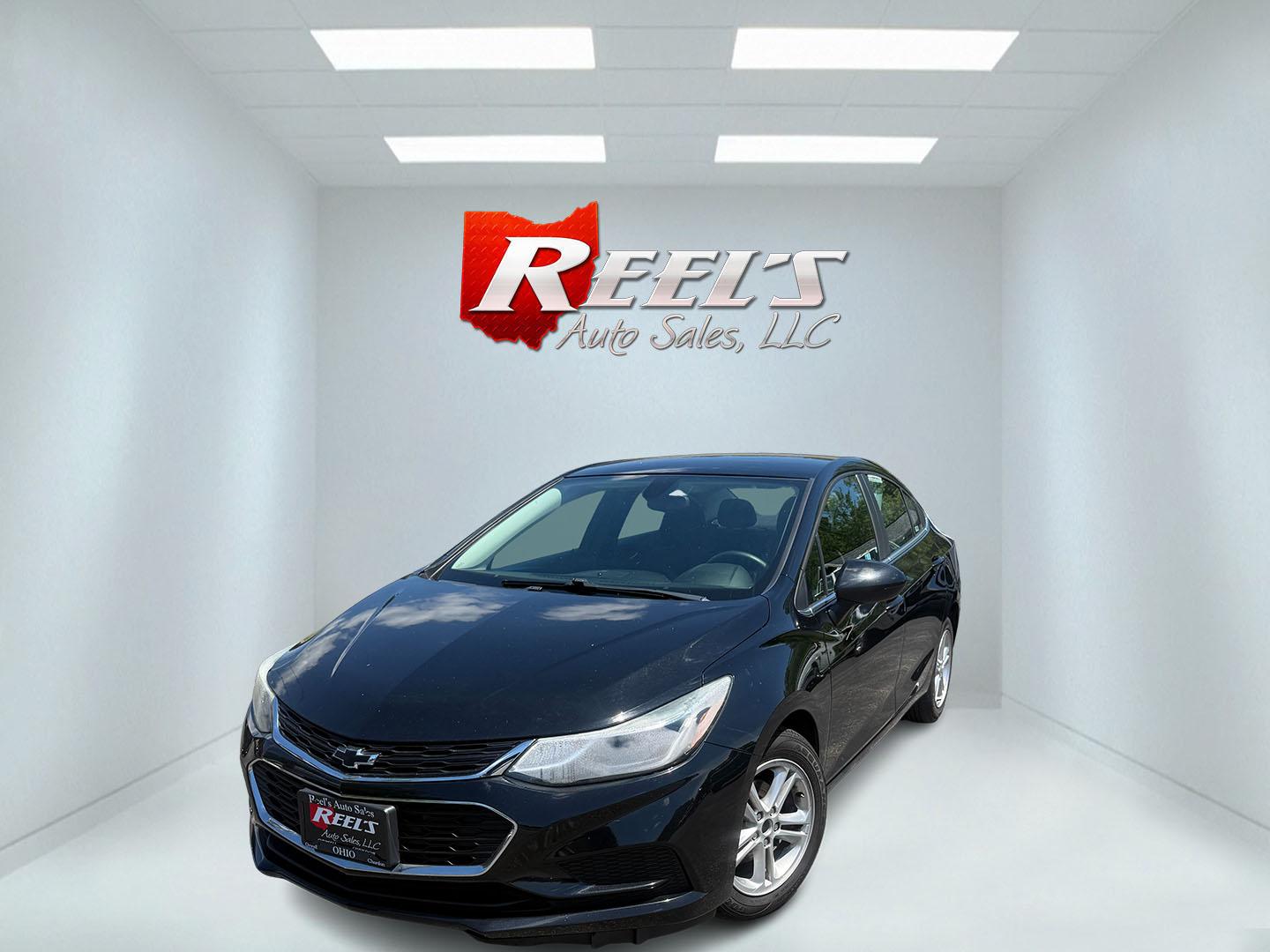 2018 Black /Black Chevrolet Cruze LT Auto (1G1BE5SM2J7) with an 1.4L I4 DOHC 16V TURBO engine, Automatic transmission, located at 547 E. Main St., Orwell, OH, 44076, (440) 437-5893, 41.535435, -80.847855 - 2018 Chevrolet Cruze LT – Turbo Efficiency, Modern Tech, and Outstanding Fuel Economy! This clean 2018 Chevrolet Cruze LT is a sharp, fuel-efficient compact sedan that delivers great performance without sacrificing savings at the pump. Powered by a responsive 1.4L Turbocharged EcoTec engine paire- Photo#0