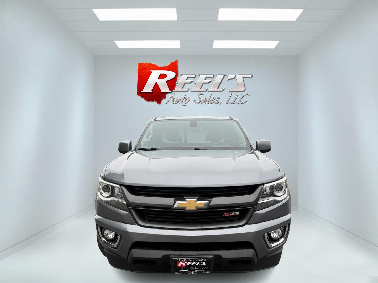 2018 Gray /Black Chevrolet Colorado Z71 Ext. Cab 4WD (1GCHTDEN2J1) with an 3.6L V6 DOHC 24V GAS engine, Automatic transmission, located at 547 E. Main St., Orwell, OH, 44076, (440) 437-5893, 41.535435, -80.847855 - 2018 Chevrolet Colorado Z71 Extended Cab 4WD – Off-Road Ready with V6 Power and Modern Comfort! This 2018 Chevrolet Colorado Z71 Extended Cab 4WD is a capable midsize truck that blends off-road toughness with everyday usability. Powered by a strong 3.6L V6 engine paired with a smooth 8-speed auto- Photo#1