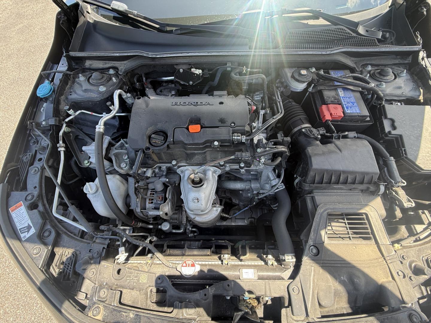 2024 Black /Black Honda Civic LX Hatchback (19XFL2H54RE) with an 2.0L I4 DOHC 16V engine, Automatic transmission, located at 547 E. Main St., Orwell, OH, 44076, (440) 437-5893, 41.535435, -80.847855 - 2024 Honda Civic LX Hatchback – Efficient, Reliable, and Loaded with Modern Safety Features! This 2024 Honda Civic LX Hatchback is a sharp, practical, and fuel-efficient choice that delivers Honda’s legendary reliability in a versatile and modern package. Powered by a smooth 2.0L Earth Dreams I- Photo#6