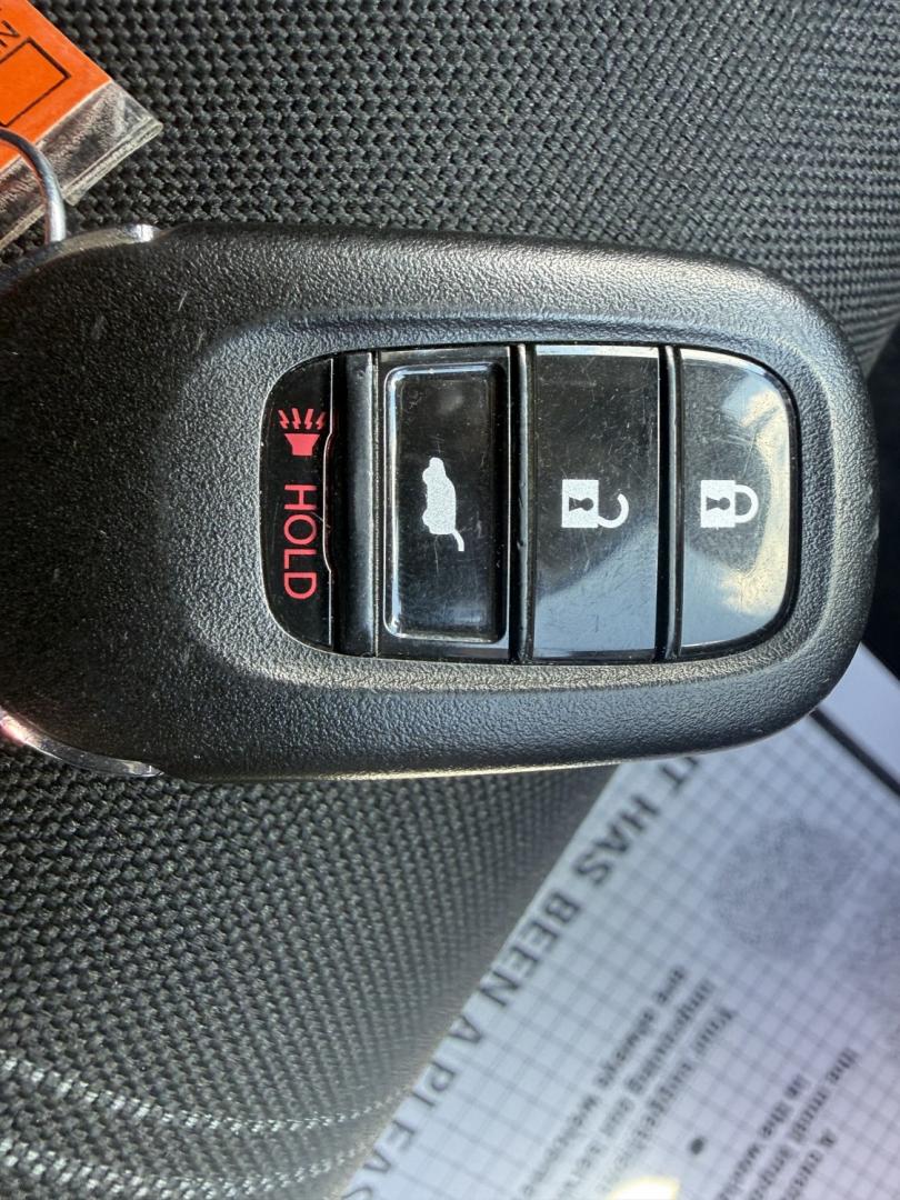 2024 Black /Black Honda Civic LX Hatchback (19XFL2H54RE) with an 2.0L I4 DOHC 16V engine, Automatic transmission, located at 547 E. Main St., Orwell, OH, 44076, (440) 437-5893, 41.535435, -80.847855 - 2024 Honda Civic LX Hatchback – Efficient, Reliable, and Loaded with Modern Safety Features! This 2024 Honda Civic LX Hatchback is a sharp, practical, and fuel-efficient choice that delivers Honda’s legendary reliability in a versatile and modern package. Powered by a smooth 2.0L Earth Dreams I- Photo#35