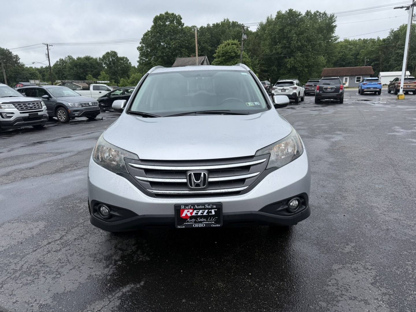 2014 Silver /Gray Honda CR-V EX-L 4WD 5-Speed AT (2HKRM4H71EH) with an 2.4L I4 DOHC 16V engine, Automatic transmission, located at 547 E. Main St., Orwell, OH, 44076, (440) 437-5893, 41.535435, -80.847855 - 2014 Honda CR-V EX-L 4WD – Premium Compact SUV with Fresh Service and Honda Reliability! This 2014 Honda CR-V EX-L 4WD is a clean, well-maintained compact SUV that offers upscale comfort and proven all-weather capability. Powered by a smooth 2.4L I4 engine paired with a durable 5-speed automatic- Photo#1
