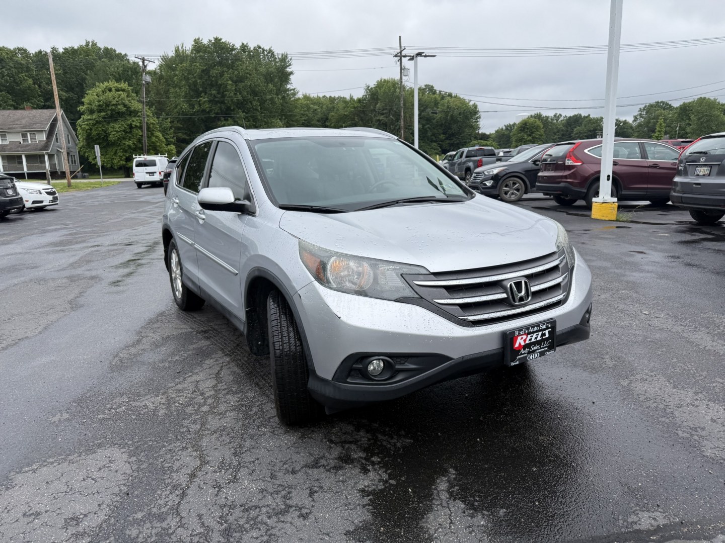 2014 Silver /Gray Honda CR-V EX-L 4WD 5-Speed AT (2HKRM4H71EH) with an 2.4L I4 DOHC 16V engine, Automatic transmission, located at 547 E. Main St., Orwell, OH, 44076, (440) 437-5893, 41.535435, -80.847855 - 2014 Honda CR-V EX-L 4WD – Premium Compact SUV with Fresh Service and Honda Reliability! This 2014 Honda CR-V EX-L 4WD is a clean, well-maintained compact SUV that offers upscale comfort and proven all-weather capability. Powered by a smooth 2.4L I4 engine paired with a durable 5-speed automatic- Photo#2