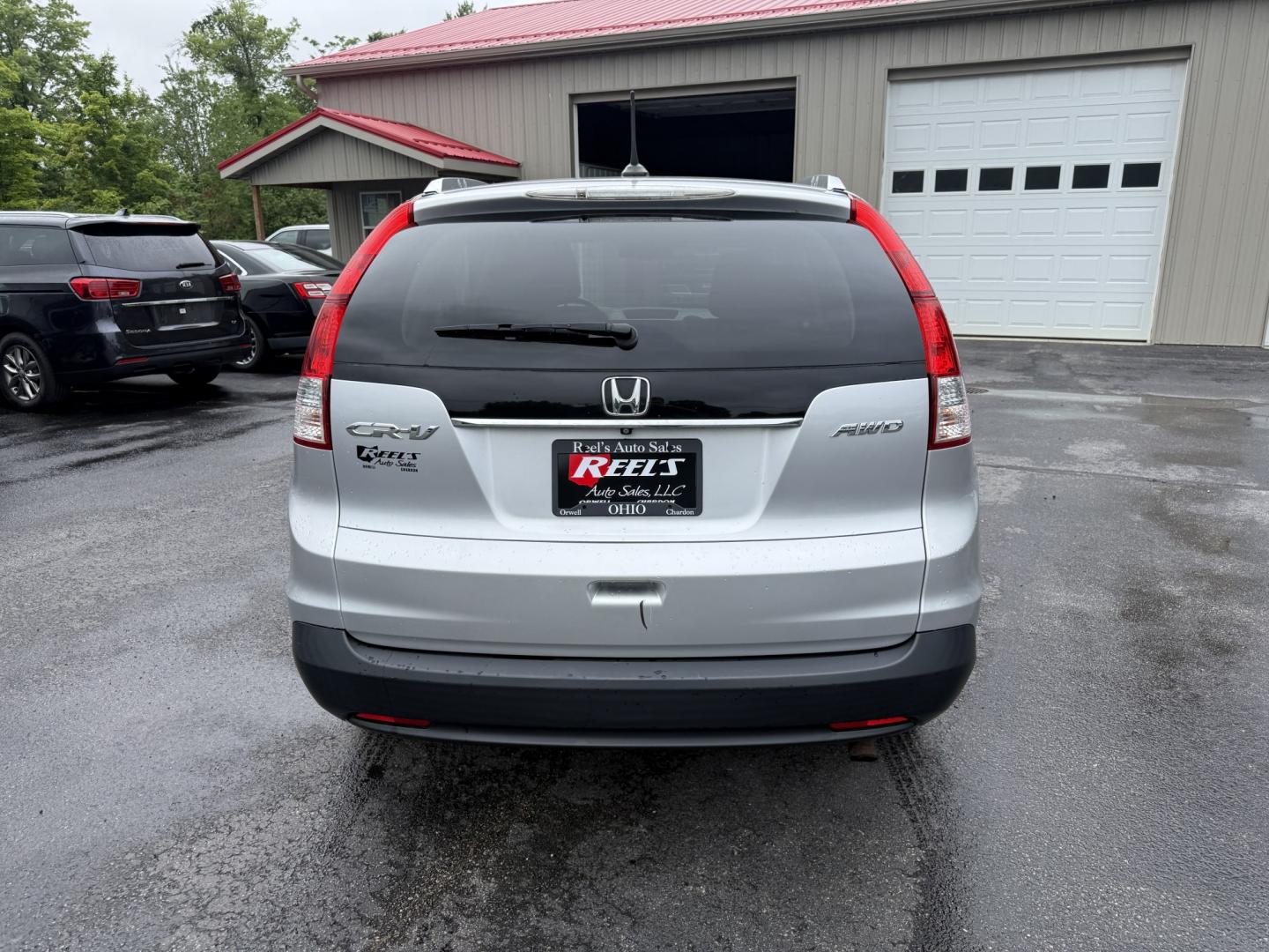 2014 Silver /Gray Honda CR-V EX-L 4WD 5-Speed AT (2HKRM4H71EH) with an 2.4L I4 DOHC 16V engine, Automatic transmission, located at 547 E. Main St., Orwell, OH, 44076, (440) 437-5893, 41.535435, -80.847855 - 2014 Honda CR-V EX-L 4WD – Premium Compact SUV with Fresh Service and Honda Reliability! This 2014 Honda CR-V EX-L 4WD is a clean, well-maintained compact SUV that offers upscale comfort and proven all-weather capability. Powered by a smooth 2.4L I4 engine paired with a durable 5-speed automatic- Photo#29