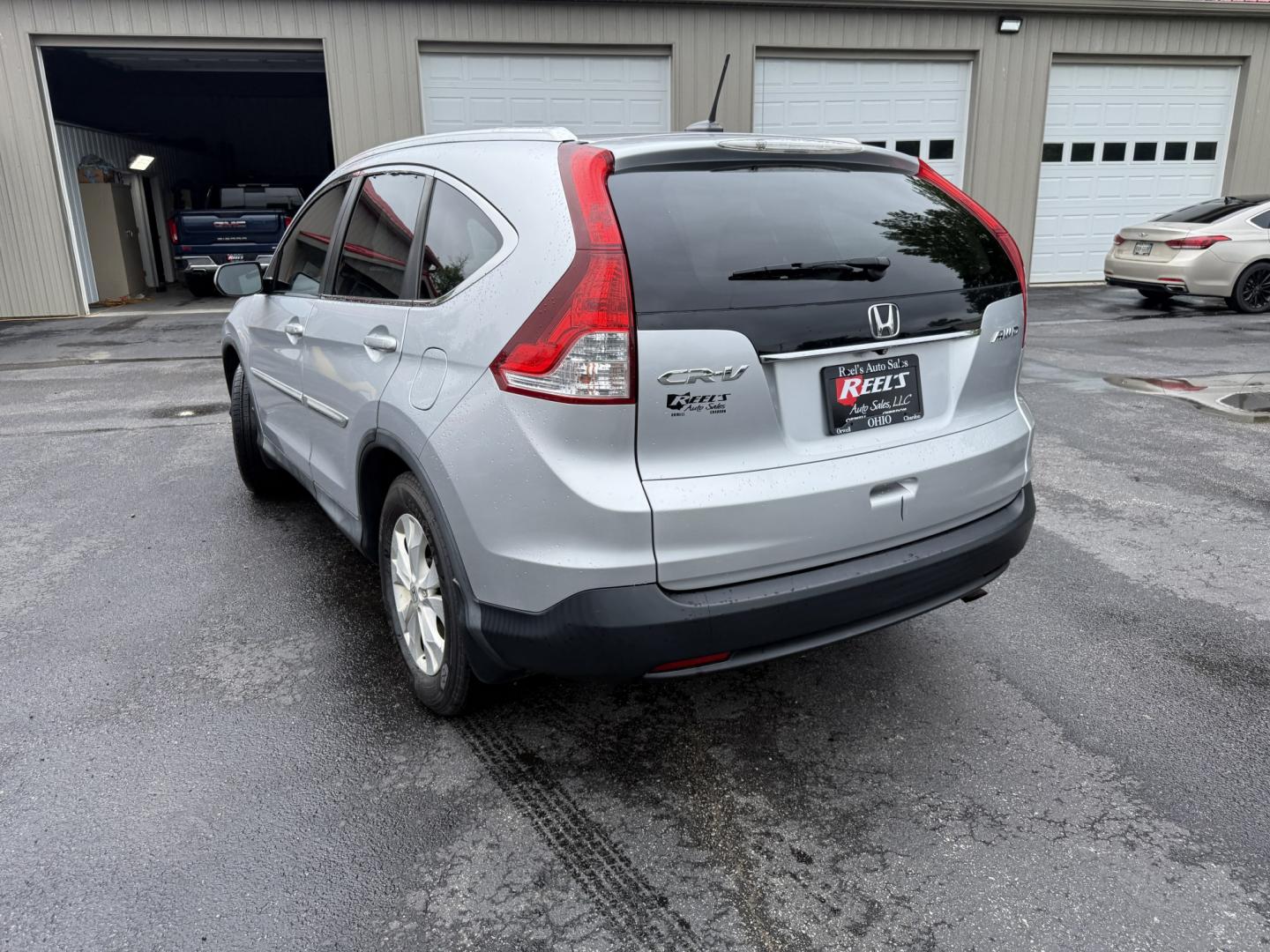 2014 Silver /Gray Honda CR-V EX-L 4WD 5-Speed AT (2HKRM4H71EH) with an 2.4L I4 DOHC 16V engine, Automatic transmission, located at 547 E. Main St., Orwell, OH, 44076, (440) 437-5893, 41.535435, -80.847855 - 2014 Honda CR-V EX-L 4WD – Premium Compact SUV with Fresh Service and Honda Reliability! This 2014 Honda CR-V EX-L 4WD is a clean, well-maintained compact SUV that offers upscale comfort and proven all-weather capability. Powered by a smooth 2.4L I4 engine paired with a durable 5-speed automatic- Photo#30