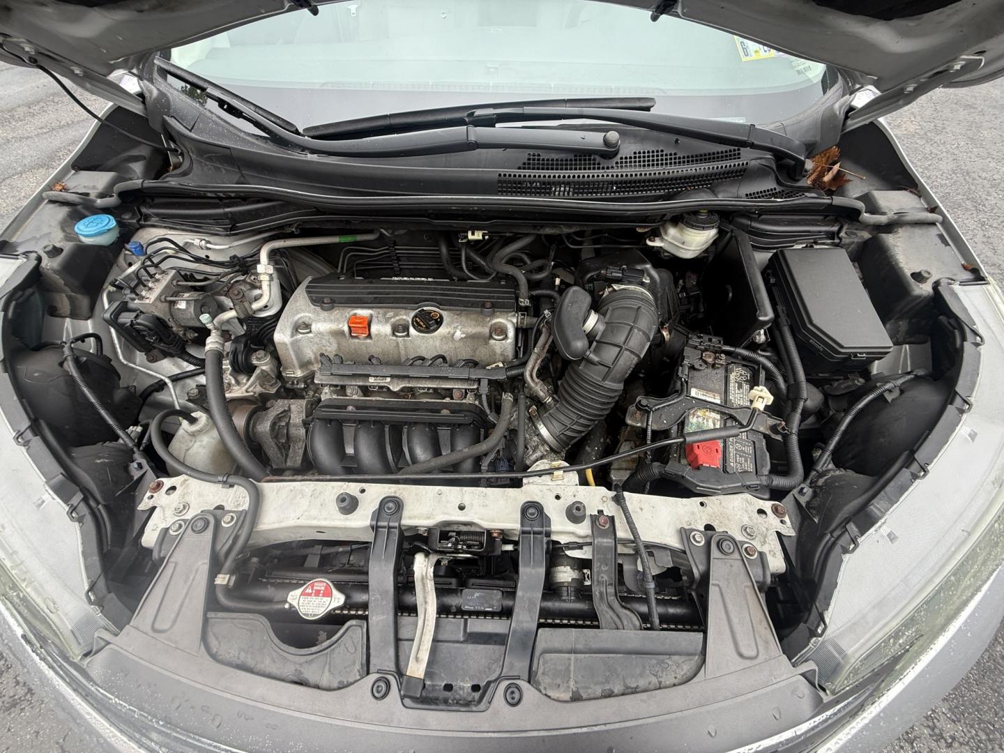 2014 Silver /Gray Honda CR-V EX-L 4WD 5-Speed AT (2HKRM4H71EH) with an 2.4L I4 DOHC 16V engine, Automatic transmission, located at 547 E. Main St., Orwell, OH, 44076, (440) 437-5893, 41.535435, -80.847855 - 2014 Honda CR-V EX-L 4WD – Premium Compact SUV with Fresh Service and Honda Reliability! This 2014 Honda CR-V EX-L 4WD is a clean, well-maintained compact SUV that offers upscale comfort and proven all-weather capability. Powered by a smooth 2.4L I4 engine paired with a durable 5-speed automatic- Photo#6