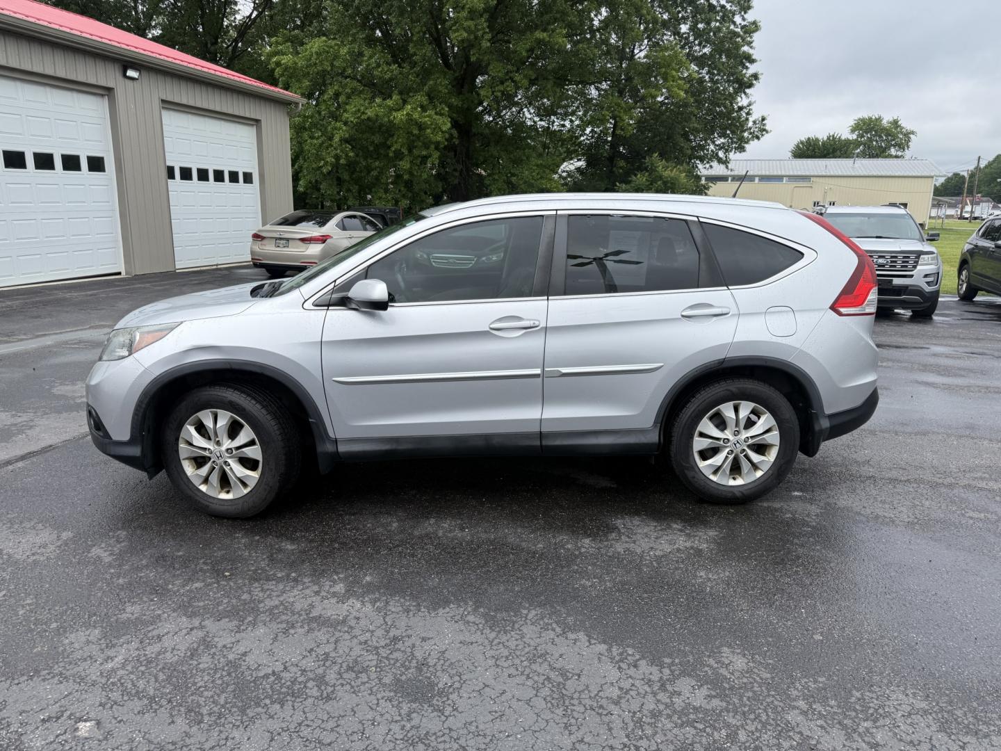 2014 Silver /Gray Honda CR-V EX-L 4WD 5-Speed AT (2HKRM4H71EH) with an 2.4L I4 DOHC 16V engine, Automatic transmission, located at 547 E. Main St., Orwell, OH, 44076, (440) 437-5893, 41.535435, -80.847855 - 2014 Honda CR-V EX-L 4WD – Premium Compact SUV with Fresh Service and Honda Reliability! This 2014 Honda CR-V EX-L 4WD is a clean, well-maintained compact SUV that offers upscale comfort and proven all-weather capability. Powered by a smooth 2.4L I4 engine paired with a durable 5-speed automatic- Photo#33