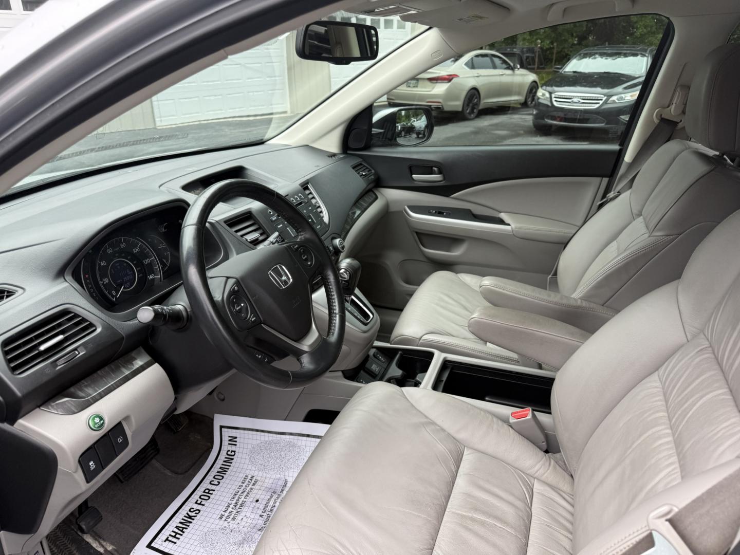 2014 Silver /Gray Honda CR-V EX-L 4WD 5-Speed AT (2HKRM4H71EH) with an 2.4L I4 DOHC 16V engine, Automatic transmission, located at 547 E. Main St., Orwell, OH, 44076, (440) 437-5893, 41.535435, -80.847855 - 2014 Honda CR-V EX-L 4WD – Premium Compact SUV with Fresh Service and Honda Reliability! This 2014 Honda CR-V EX-L 4WD is a clean, well-maintained compact SUV that offers upscale comfort and proven all-weather capability. Powered by a smooth 2.4L I4 engine paired with a durable 5-speed automatic- Photo#7