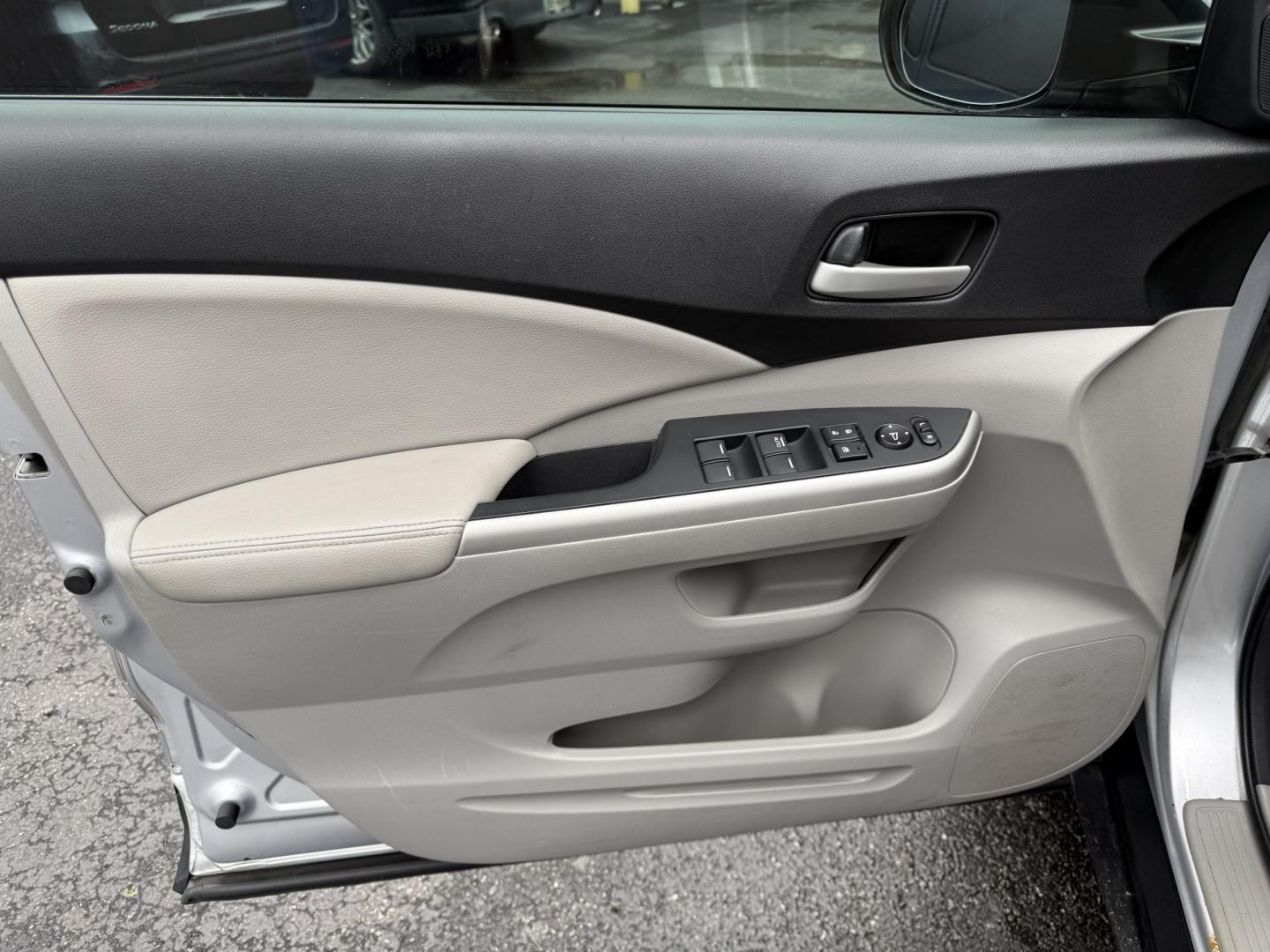 2014 Silver /Gray Honda CR-V EX-L 4WD 5-Speed AT (2HKRM4H71EH) with an 2.4L I4 DOHC 16V engine, Automatic transmission, located at 547 E. Main St., Orwell, OH, 44076, (440) 437-5893, 41.535435, -80.847855 - 2014 Honda CR-V EX-L 4WD – Premium Compact SUV with Fresh Service and Honda Reliability! This 2014 Honda CR-V EX-L 4WD is a clean, well-maintained compact SUV that offers upscale comfort and proven all-weather capability. Powered by a smooth 2.4L I4 engine paired with a durable 5-speed automatic- Photo#35