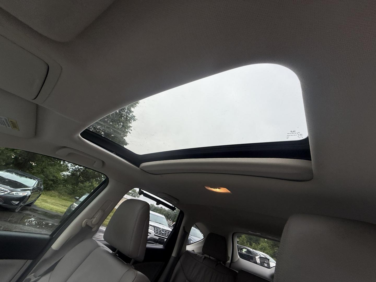 2014 Silver /Gray Honda CR-V EX-L 4WD 5-Speed AT (2HKRM4H71EH) with an 2.4L I4 DOHC 16V engine, Automatic transmission, located at 547 E. Main St., Orwell, OH, 44076, (440) 437-5893, 41.535435, -80.847855 - 2014 Honda CR-V EX-L 4WD – Premium Compact SUV with Fresh Service and Honda Reliability! This 2014 Honda CR-V EX-L 4WD is a clean, well-maintained compact SUV that offers upscale comfort and proven all-weather capability. Powered by a smooth 2.4L I4 engine paired with a durable 5-speed automatic- Photo#21