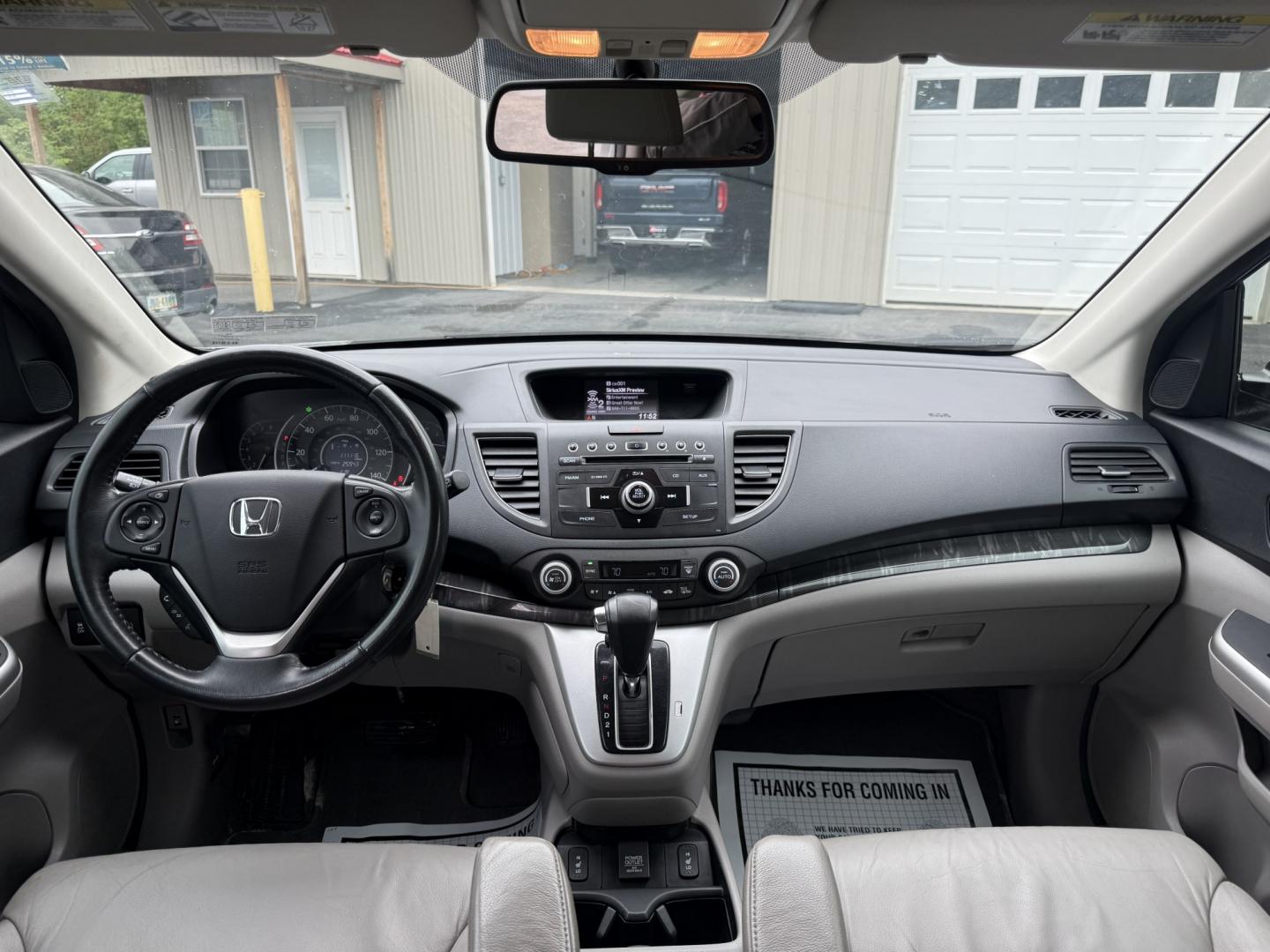 2014 Silver /Gray Honda CR-V EX-L 4WD 5-Speed AT (2HKRM4H71EH) with an 2.4L I4 DOHC 16V engine, Automatic transmission, located at 547 E. Main St., Orwell, OH, 44076, (440) 437-5893, 41.535435, -80.847855 - 2014 Honda CR-V EX-L 4WD – Premium Compact SUV with Fresh Service and Honda Reliability! This 2014 Honda CR-V EX-L 4WD is a clean, well-maintained compact SUV that offers upscale comfort and proven all-weather capability. Powered by a smooth 2.4L I4 engine paired with a durable 5-speed automatic- Photo#23
