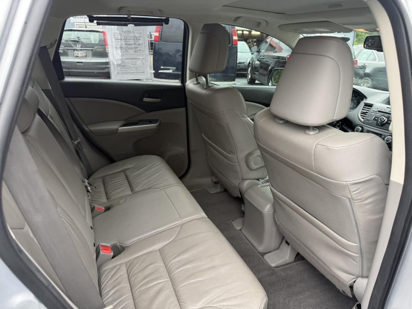 2014 Silver /Gray Honda CR-V EX-L 4WD 5-Speed AT (2HKRM4H71EH) with an 2.4L I4 DOHC 16V engine, Automatic transmission, located at 547 E. Main St., Orwell, OH, 44076, (440) 437-5893, 41.535435, -80.847855 - 2014 Honda CR-V EX-L 4WD – Premium Compact SUV with Fresh Service and Honda Reliability! This 2014 Honda CR-V EX-L 4WD is a clean, well-maintained compact SUV that offers upscale comfort and proven all-weather capability. Powered by a smooth 2.4L I4 engine paired with a durable 5-speed automatic- Photo#40