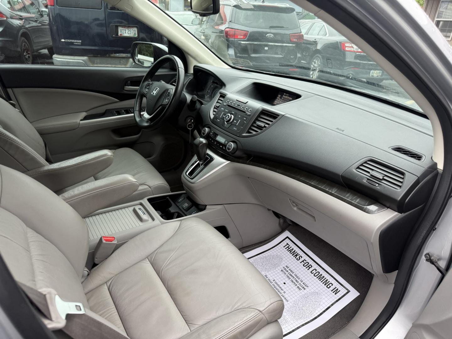 2014 Silver /Gray Honda CR-V EX-L 4WD 5-Speed AT (2HKRM4H71EH) with an 2.4L I4 DOHC 16V engine, Automatic transmission, located at 547 E. Main St., Orwell, OH, 44076, (440) 437-5893, 41.535435, -80.847855 - 2014 Honda CR-V EX-L 4WD – Premium Compact SUV with Fresh Service and Honda Reliability! This 2014 Honda CR-V EX-L 4WD is a clean, well-maintained compact SUV that offers upscale comfort and proven all-weather capability. Powered by a smooth 2.4L I4 engine paired with a durable 5-speed automatic- Photo#42