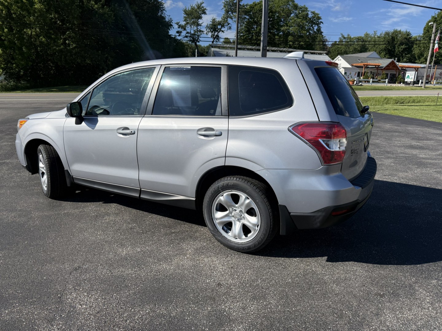 2016 Silver /Black Subaru Forester 2.5i PZEV CVT (JF2SJAAC4GH) with an 2.5L H4 DOHC 16V engine, Automatic transmission, located at 11115 Chardon Rd. , Chardon, OH, 44024, (440) 214-9705, 41.580246, -81.241943 - 2016 Subaru Forester 2.5i PZEV AWD – Reliable, Efficient, and Freshly Serviced! This 2016 Subaru Forester 2.5i PZEV is a clean and capable compact SUV that offers excellent all-weather performance and peace of mind. Powered by a smooth 2.5L H4 engine paired with Subaru’s legendary Symmetrical A- Photo#23