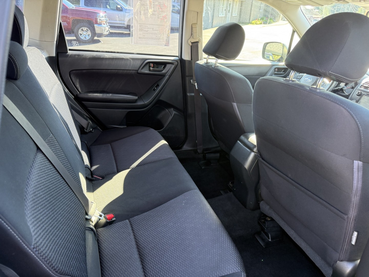 2016 Silver /Black Subaru Forester 2.5i PZEV CVT (JF2SJAAC4GH) with an 2.5L H4 DOHC 16V engine, Automatic transmission, located at 11115 Chardon Rd. , Chardon, OH, 44024, (440) 214-9705, 41.580246, -81.241943 - 2016 Subaru Forester 2.5i PZEV AWD – Reliable, Efficient, and Freshly Serviced! This 2016 Subaru Forester 2.5i PZEV is a clean and capable compact SUV that offers excellent all-weather performance and peace of mind. Powered by a smooth 2.5L H4 engine paired with Subaru’s legendary Symmetrical A- Photo#30