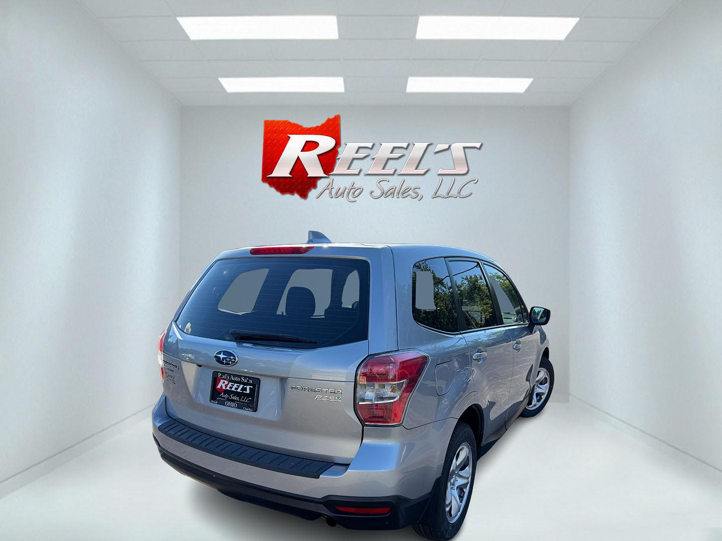 2016 Silver /Black Subaru Forester 2.5i PZEV CVT (JF2SJAAC4GH) with an 2.5L H4 DOHC 16V engine, Automatic transmission, located at 11115 Chardon Rd. , Chardon, OH, 44024, (440) 214-9705, 41.580246, -81.241943 - 2016 Subaru Forester 2.5i PZEV AWD – Reliable, Efficient, and Freshly Serviced! This 2016 Subaru Forester 2.5i PZEV is a clean and capable compact SUV that offers excellent all-weather performance and peace of mind. Powered by a smooth 2.5L H4 engine paired with Subaru’s legendary Symmetrical A- Photo#20