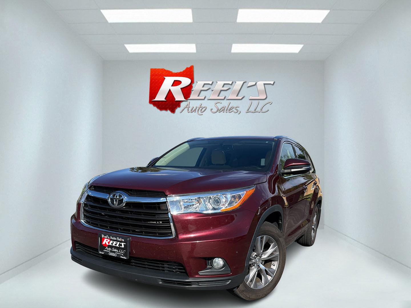 2014 Red /Tan Toyota Highlander XLE AWD V6 (5TDJKRFHXES) with an 3.5L V6 DOHC 24V engine, Automatic transmission, located at 547 E. Main St., Orwell, OH, 44076, (440) 437-5893, 41.535435, -80.847855 - 2014 Toyota Highlander XLE AWD – Spacious 3-Row SUV with V6 Power and Premium Comfort! This 2014 Toyota Highlander XLE AWD is a versatile and reliable midsize SUV that’s perfect for families and daily driving. Powered by a smooth 3.5L V6 engine paired with a responsive 6-speed automatic transmi- Photo#0