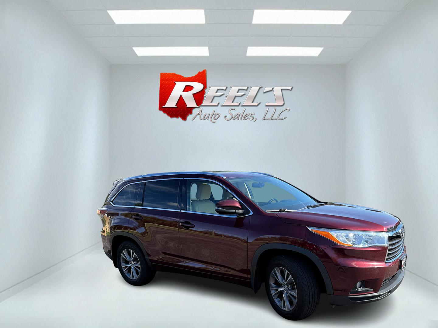 2014 Red /Tan Toyota Highlander XLE AWD V6 (5TDJKRFHXES) with an 3.5L V6 DOHC 24V engine, Automatic transmission, located at 547 E. Main St., Orwell, OH, 44076, (440) 437-5893, 41.535435, -80.847855 - 2014 Toyota Highlander XLE AWD – Spacious 3-Row SUV with V6 Power and Premium Comfort! This 2014 Toyota Highlander XLE AWD is a versatile and reliable midsize SUV that’s perfect for families and daily driving. Powered by a smooth 3.5L V6 engine paired with a responsive 6-speed automatic transmi- Photo#3
