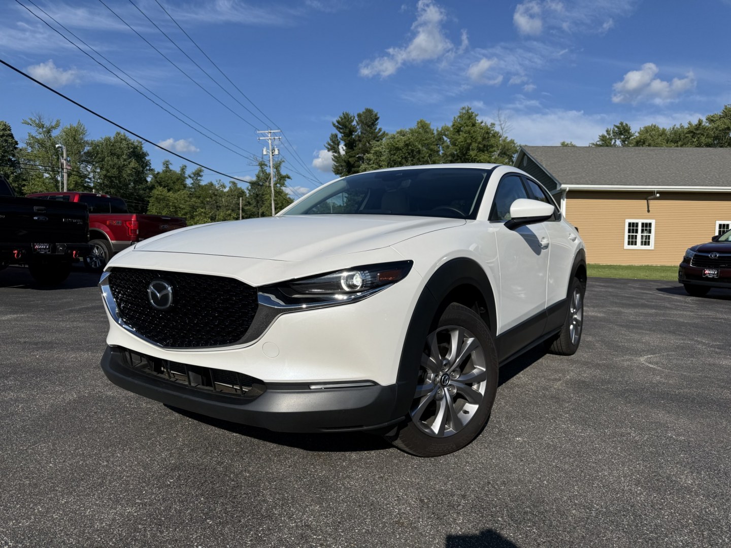 2021 White /Black Mazda CX-30 Select W/ Preferred Pkg AWD (3MVDMBCL6MM) with an 2.5L I4 DOHC 16V engine, Automatic transmission, located at 11115 Chardon Rd. , Chardon, OH, 44024, (440) 214-9705, 41.580246, -81.241943 - 2021 Mazda CX-30 AWD – Premium Compact SUV with Sharp Styling, Strong Safety, and Excellent Efficiency! This 2021 Mazda CX-30 AWD is a stylish and well-equipped compact crossover that delivers a premium driving experience in a fun-to-drive package. Powered by a smooth 2.5L I4 engine paired with a- Photo#0
