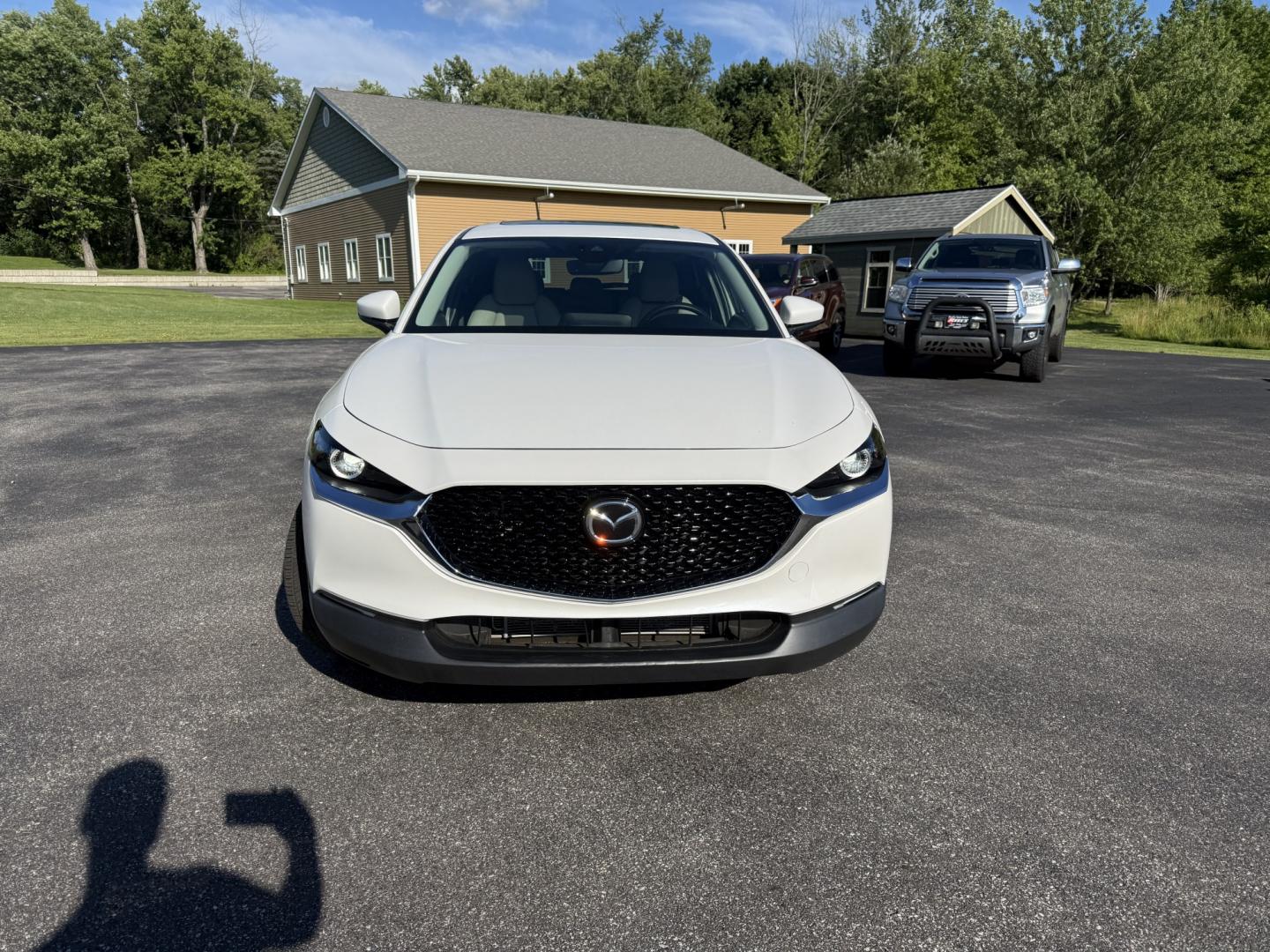 2021 White /Black Mazda CX-30 Select W/ Preferred Pkg AWD (3MVDMBCL6MM) with an 2.5L I4 DOHC 16V engine, Automatic transmission, located at 11115 Chardon Rd. , Chardon, OH, 44024, (440) 214-9705, 41.580246, -81.241943 - 2021 Mazda CX-30 AWD – Premium Compact SUV with Sharp Styling, Strong Safety, and Excellent Efficiency! This 2021 Mazda CX-30 AWD is a stylish and well-equipped compact crossover that delivers a premium driving experience in a fun-to-drive package. Powered by a smooth 2.5L I4 engine paired with a- Photo#1