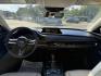 2021 White /Black Mazda CX-30 Select W/ Preferred Pkg AWD (3MVDMBCL6MM) with an 2.5L I4 DOHC 16V engine, Automatic transmission, located at 11115 Chardon Rd. , Chardon, OH, 44024, (440) 214-9705, 41.580246, -81.241943 - 2021 Mazda CX-30 AWD – Premium Compact SUV with Sharp Styling, Strong Safety, and Excellent Efficiency! This 2021 Mazda CX-30 AWD is a stylish and well-equipped compact crossover that delivers a premium driving experience in a fun-to-drive package. Powered by a smooth 2.5L I4 engine paired with a- Photo#26