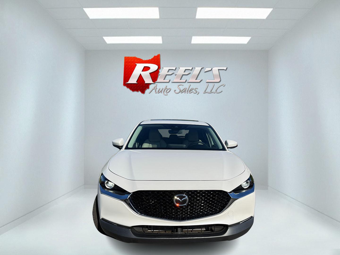 2021 White /Black Mazda CX-30 Select W/ Preferred Pkg AWD (3MVDMBCL6MM) with an 2.5L I4 DOHC 16V engine, Automatic transmission, located at 11115 Chardon Rd. , Chardon, OH, 44024, (440) 214-9705, 41.580246, -81.241943 - 2021 Mazda CX-30 AWD – Premium Compact SUV with Sharp Styling, Strong Safety, and Excellent Efficiency! This 2021 Mazda CX-30 AWD is a stylish and well-equipped compact crossover that delivers a premium driving experience in a fun-to-drive package. Powered by a smooth 2.5L I4 engine paired with a- Photo#1