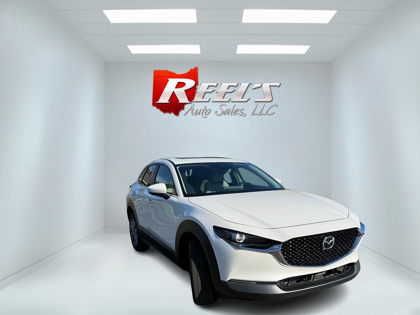 2021 White /Black Mazda CX-30 Select W/ Preferred Pkg AWD (3MVDMBCL6MM) with an 2.5L I4 DOHC 16V engine, Automatic transmission, located at 11115 Chardon Rd. , Chardon, OH, 44024, (440) 214-9705, 41.580246, -81.241943 - 2021 Mazda CX-30 AWD – Premium Compact SUV with Sharp Styling, Strong Safety, and Excellent Efficiency! This 2021 Mazda CX-30 AWD is a stylish and well-equipped compact crossover that delivers a premium driving experience in a fun-to-drive package. Powered by a smooth 2.5L I4 engine paired with a- Photo#2