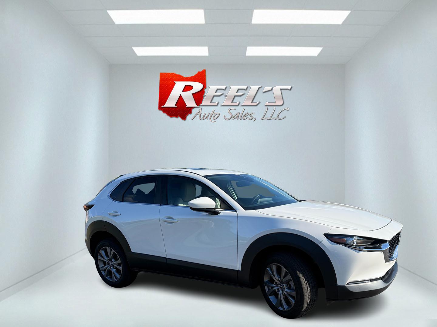 2021 White /Black Mazda CX-30 Select W/ Preferred Pkg AWD (3MVDMBCL6MM) with an 2.5L I4 DOHC 16V engine, Automatic transmission, located at 11115 Chardon Rd. , Chardon, OH, 44024, (440) 214-9705, 41.580246, -81.241943 - 2021 Mazda CX-30 AWD – Premium Compact SUV with Sharp Styling, Strong Safety, and Excellent Efficiency! This 2021 Mazda CX-30 AWD is a stylish and well-equipped compact crossover that delivers a premium driving experience in a fun-to-drive package. Powered by a smooth 2.5L I4 engine paired with a- Photo#3
