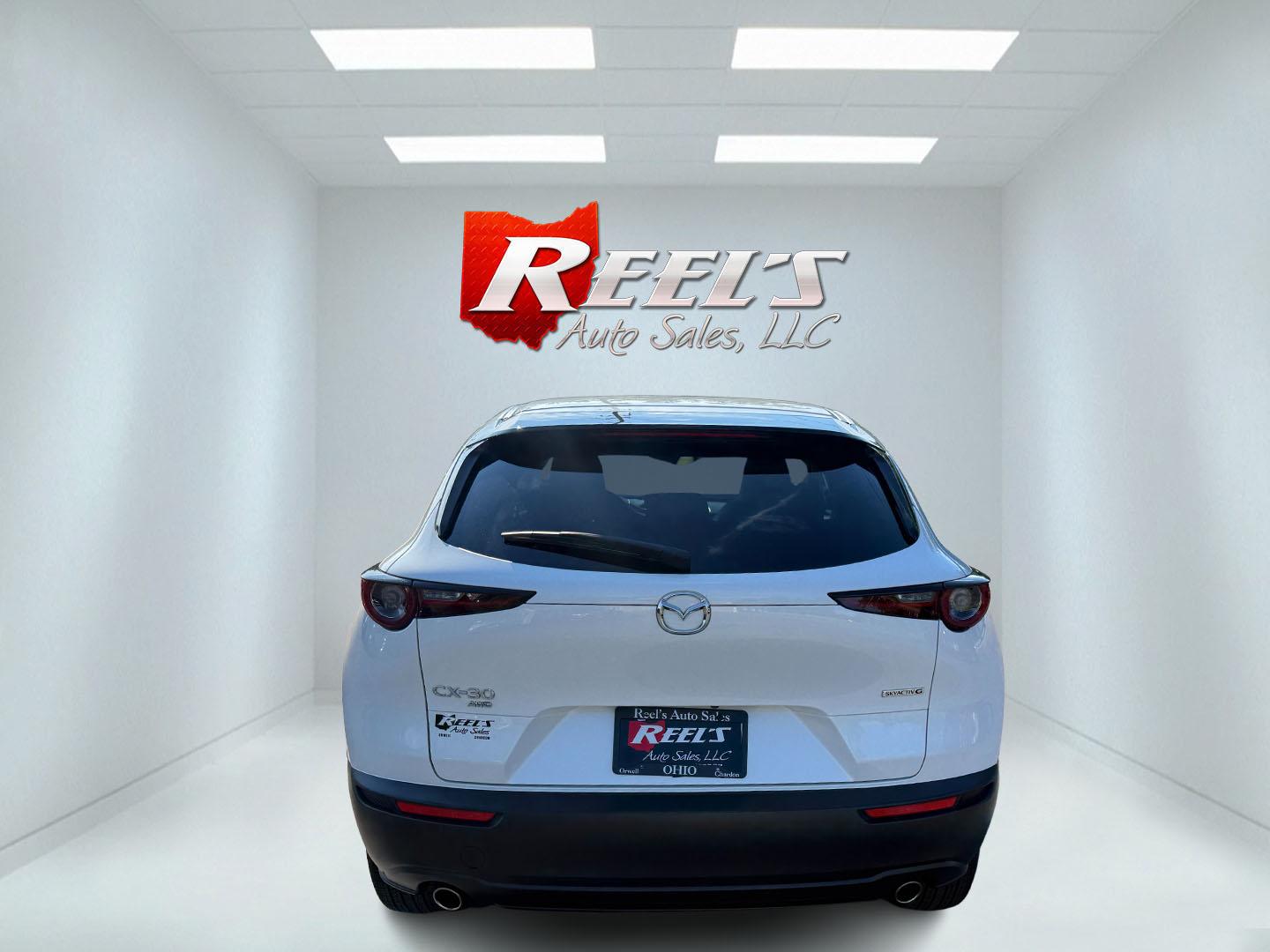 2021 White /Black Mazda CX-30 Select W/ Preferred Pkg AWD (3MVDMBCL6MM) with an 2.5L I4 DOHC 16V engine, Automatic transmission, located at 11115 Chardon Rd. , Chardon, OH, 44024, (440) 214-9705, 41.580246, -81.241943 - 2021 Mazda CX-30 AWD – Premium Compact SUV with Sharp Styling, Strong Safety, and Excellent Efficiency! This 2021 Mazda CX-30 AWD is a stylish and well-equipped compact crossover that delivers a premium driving experience in a fun-to-drive package. Powered by a smooth 2.5L I4 engine paired with a- Photo#32