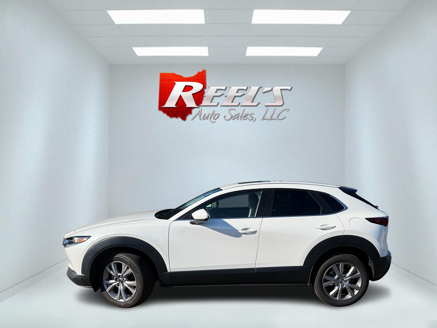 2021 White /Black Mazda CX-30 Select W/ Preferred Pkg AWD (3MVDMBCL6MM) with an 2.5L I4 DOHC 16V engine, Automatic transmission, located at 11115 Chardon Rd. , Chardon, OH, 44024, (440) 214-9705, 41.580246, -81.241943 - 2021 Mazda CX-30 AWD – Premium Compact SUV with Sharp Styling, Strong Safety, and Excellent Efficiency! This 2021 Mazda CX-30 AWD is a stylish and well-equipped compact crossover that delivers a premium driving experience in a fun-to-drive package. Powered by a smooth 2.5L I4 engine paired with a- Photo#36