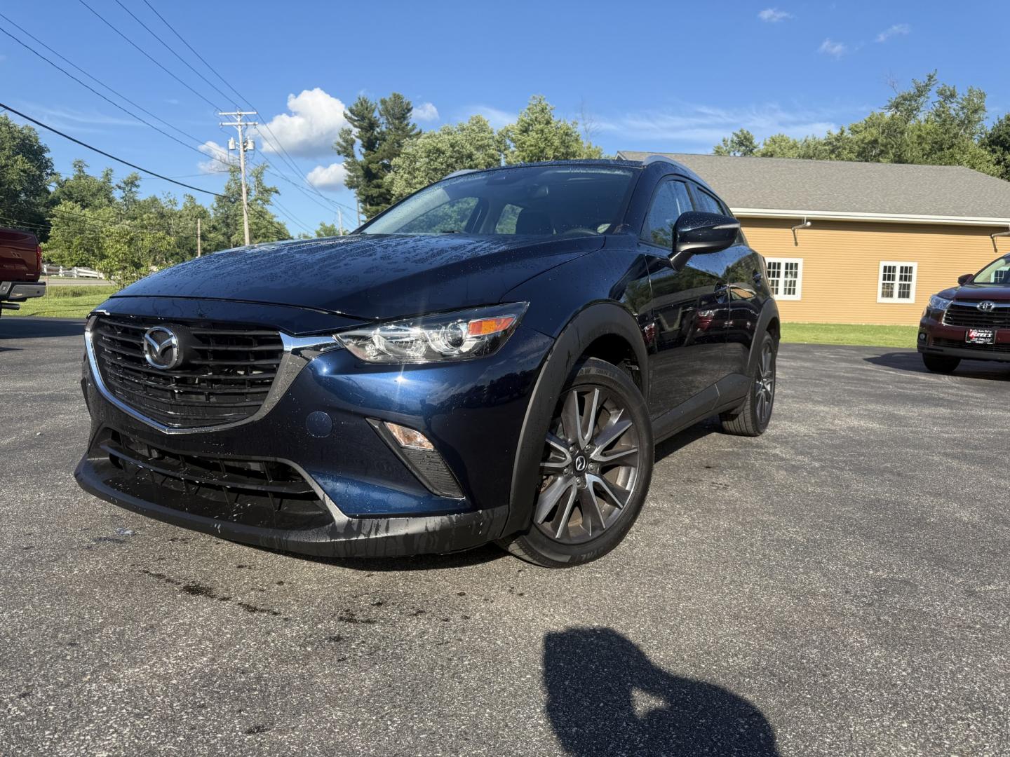 2018 Blue /Black Mazda CX-3 Touring AWD (JM1DKFC7XJ0) with an 2.0L I4 DOHC 16V engine, Automatic transmission, located at 11115 Chardon Rd. , Chardon, OH, 44024, (440) 214-9705, 41.580246, -81.241943 - 2018 Mazda CX-3 Touring AWD – Sporty, Efficient, and Premium Compact Crossover! This 2018 Mazda CX-3 Touring AWD is a fun-to-drive and stylish compact SUV that offers a great mix of performance, comfort, and efficiency. Powered by a responsive 2.5L I4 engine paired with a smooth 6-speed automatic- Photo#0