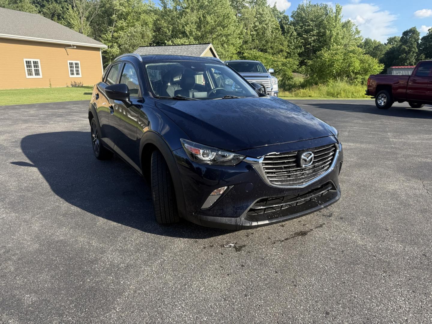 2018 Blue /Black Mazda CX-3 Touring AWD (JM1DKFC7XJ0) with an 2.0L I4 DOHC 16V engine, Automatic transmission, located at 11115 Chardon Rd. , Chardon, OH, 44024, (440) 214-9705, 41.580246, -81.241943 - 2018 Mazda CX-3 Touring AWD – Sporty, Efficient, and Premium Compact Crossover! This 2018 Mazda CX-3 Touring AWD is a fun-to-drive and stylish compact SUV that offers a great mix of performance, comfort, and efficiency. Powered by a responsive 2.5L I4 engine paired with a smooth 6-speed automatic- Photo#2