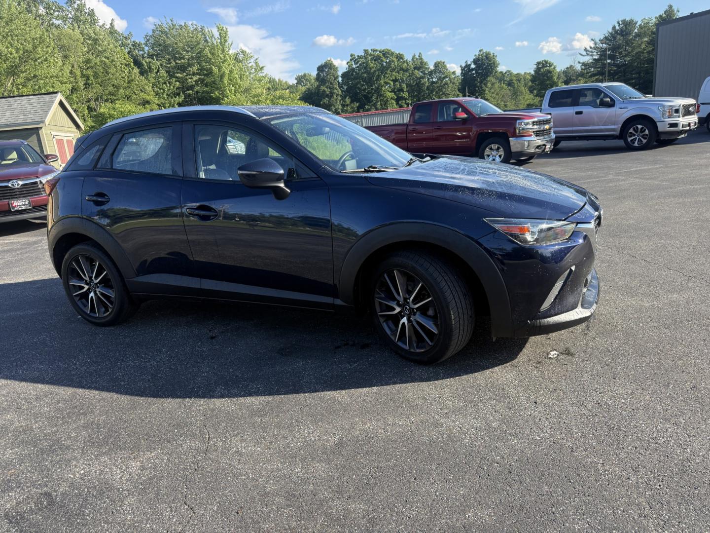 2018 Blue /Black Mazda CX-3 Touring AWD (JM1DKFC7XJ0) with an 2.0L I4 DOHC 16V engine, Automatic transmission, located at 11115 Chardon Rd. , Chardon, OH, 44024, (440) 214-9705, 41.580246, -81.241943 - 2018 Mazda CX-3 Touring AWD – Sporty, Efficient, and Premium Compact Crossover! This 2018 Mazda CX-3 Touring AWD is a fun-to-drive and stylish compact SUV that offers a great mix of performance, comfort, and efficiency. Powered by a responsive 2.5L I4 engine paired with a smooth 6-speed automatic- Photo#3