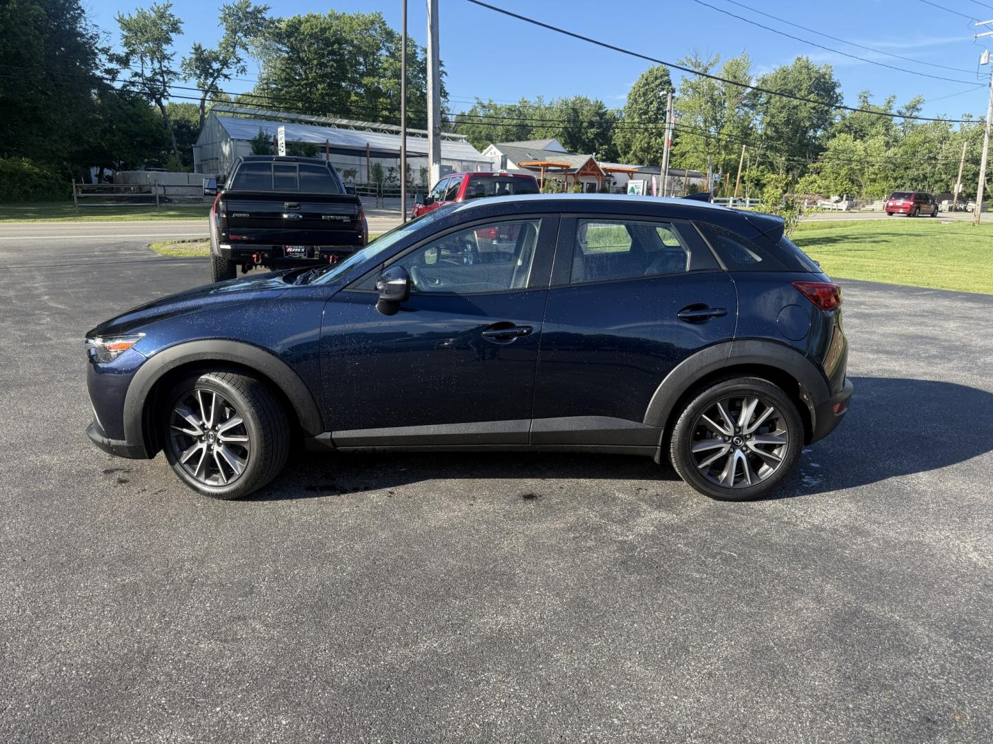 2018 Blue /Black Mazda CX-3 Touring AWD (JM1DKFC7XJ0) with an 2.0L I4 DOHC 16V engine, Automatic transmission, located at 11115 Chardon Rd. , Chardon, OH, 44024, (440) 214-9705, 41.580246, -81.241943 - 2018 Mazda CX-3 Touring AWD – Sporty, Efficient, and Premium Compact Crossover! This 2018 Mazda CX-3 Touring AWD is a fun-to-drive and stylish compact SUV that offers a great mix of performance, comfort, and efficiency. Powered by a responsive 2.5L I4 engine paired with a smooth 6-speed automatic- Photo#34