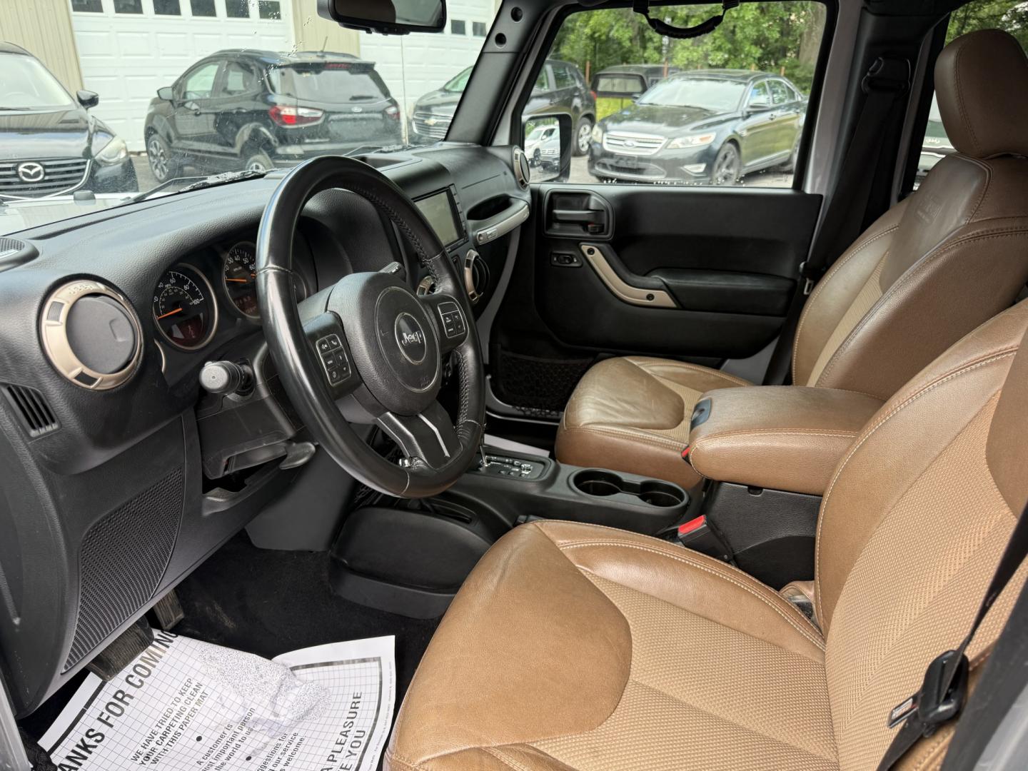 2016 Silver /Brown Jeep Wrangler Unlimited Sahara 4WD (1C4HJWEG5GL) with an 3.6L V6 DOHC 24V engine, Automatic transmission, located at 547 E. Main St., Orwell, OH, 44076, (440) 437-5893, 41.535435, -80.847855 - 2016 Jeep Wrangler Unlimited Sahara 75th Anniversary Edition 4WD – Special Edition with Premium Leather and Trail-Ready Capability! This 2016 Jeep Wrangler Unlimited Sahara 75th Anniversary Edition 4WD is a standout model that celebrates Jeep heritage with exclusive styling and premium upgrades.- Photo#10