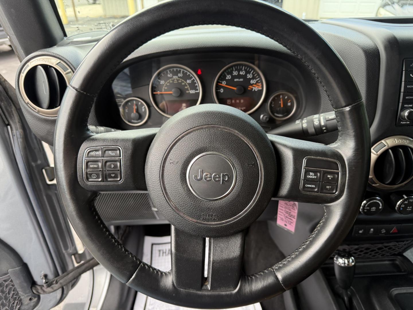 2016 Silver /Brown Jeep Wrangler Unlimited Sahara 4WD (1C4HJWEG5GL) with an 3.6L V6 DOHC 24V engine, Automatic transmission, located at 547 E. Main St., Orwell, OH, 44076, (440) 437-5893, 41.535435, -80.847855 - 2016 Jeep Wrangler Unlimited Sahara 75th Anniversary Edition 4WD – Special Edition with Premium Leather and Trail-Ready Capability! This 2016 Jeep Wrangler Unlimited Sahara 75th Anniversary Edition 4WD is a standout model that celebrates Jeep heritage with exclusive styling and premium upgrades.- Photo#12