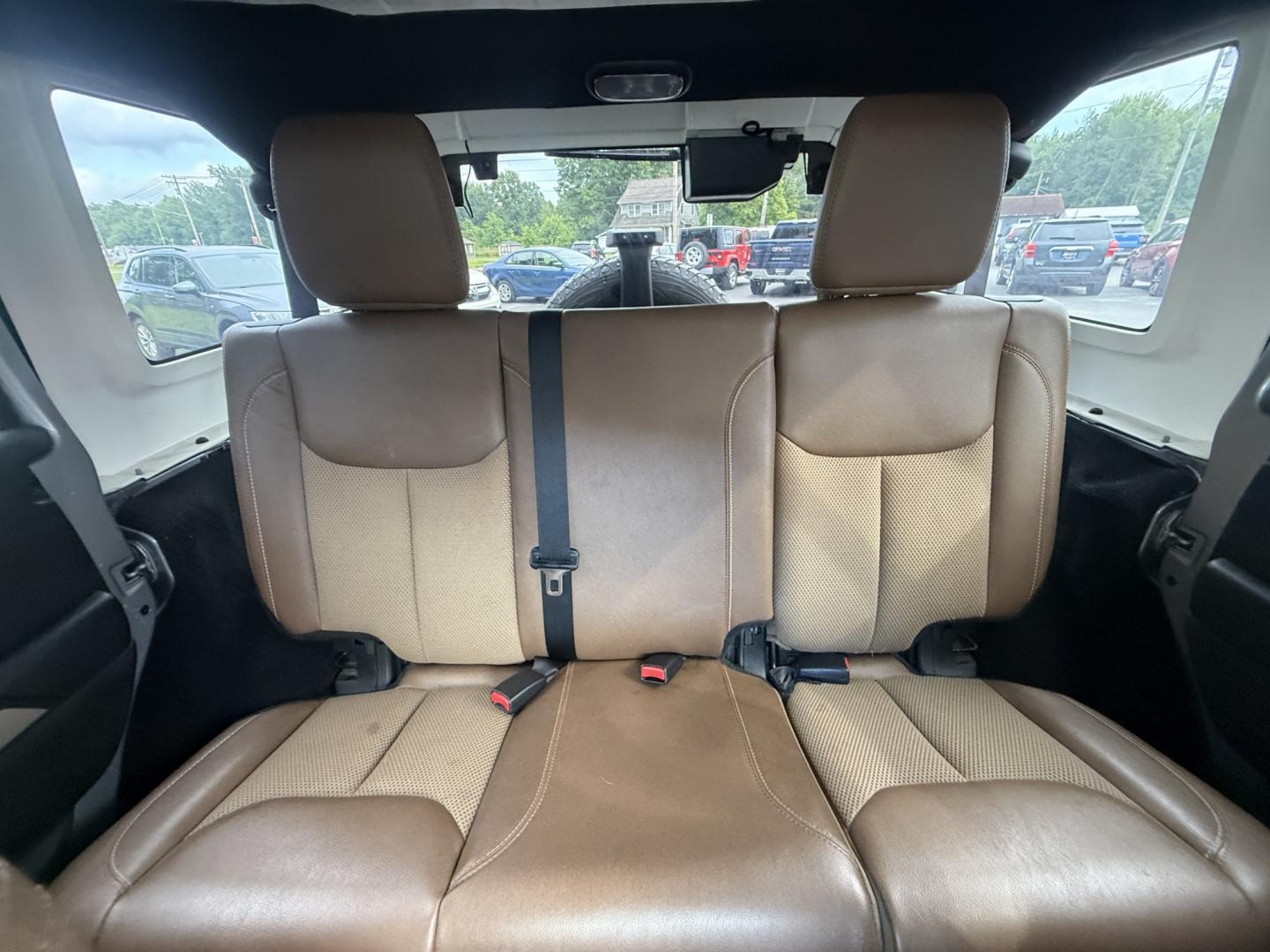 2016 Silver /Brown Jeep Wrangler Unlimited Sahara 4WD (1C4HJWEG5GL) with an 3.6L V6 DOHC 24V engine, Automatic transmission, located at 547 E. Main St., Orwell, OH, 44076, (440) 437-5893, 41.535435, -80.847855 - 2016 Jeep Wrangler Unlimited Sahara 75th Anniversary Edition 4WD – Special Edition with Premium Leather and Trail-Ready Capability! This 2016 Jeep Wrangler Unlimited Sahara 75th Anniversary Edition 4WD is a standout model that celebrates Jeep heritage with exclusive styling and premium upgrades.- Photo#22