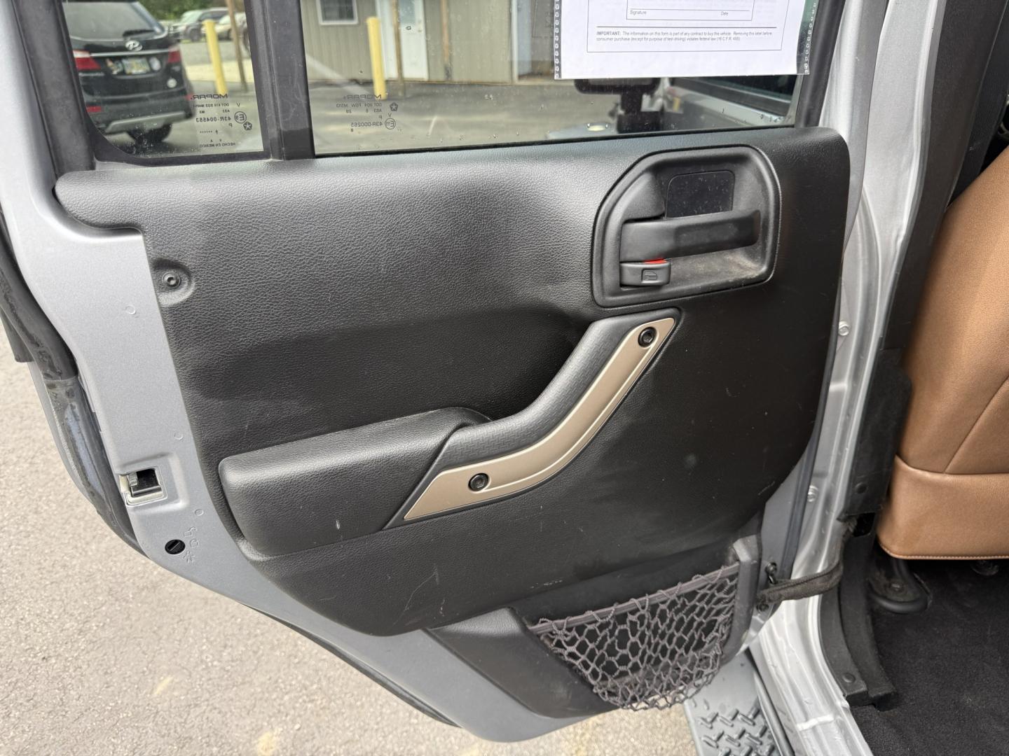 2016 Silver /Brown Jeep Wrangler Unlimited Sahara 4WD (1C4HJWEG5GL) with an 3.6L V6 DOHC 24V engine, Automatic transmission, located at 547 E. Main St., Orwell, OH, 44076, (440) 437-5893, 41.535435, -80.847855 - 2016 Jeep Wrangler Unlimited Sahara 75th Anniversary Edition 4WD – Special Edition with Premium Leather and Trail-Ready Capability! This 2016 Jeep Wrangler Unlimited Sahara 75th Anniversary Edition 4WD is a standout model that celebrates Jeep heritage with exclusive styling and premium upgrades.- Photo#38