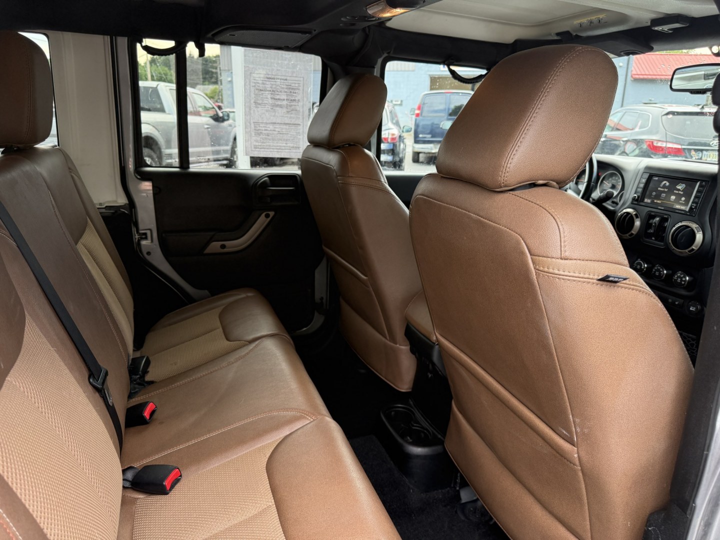 2016 Silver /Brown Jeep Wrangler Unlimited Sahara 4WD (1C4HJWEG5GL) with an 3.6L V6 DOHC 24V engine, Automatic transmission, located at 547 E. Main St., Orwell, OH, 44076, (440) 437-5893, 41.535435, -80.847855 - 2016 Jeep Wrangler Unlimited Sahara 75th Anniversary Edition 4WD – Special Edition with Premium Leather and Trail-Ready Capability! This 2016 Jeep Wrangler Unlimited Sahara 75th Anniversary Edition 4WD is a standout model that celebrates Jeep heritage with exclusive styling and premium upgrades.- Photo#39