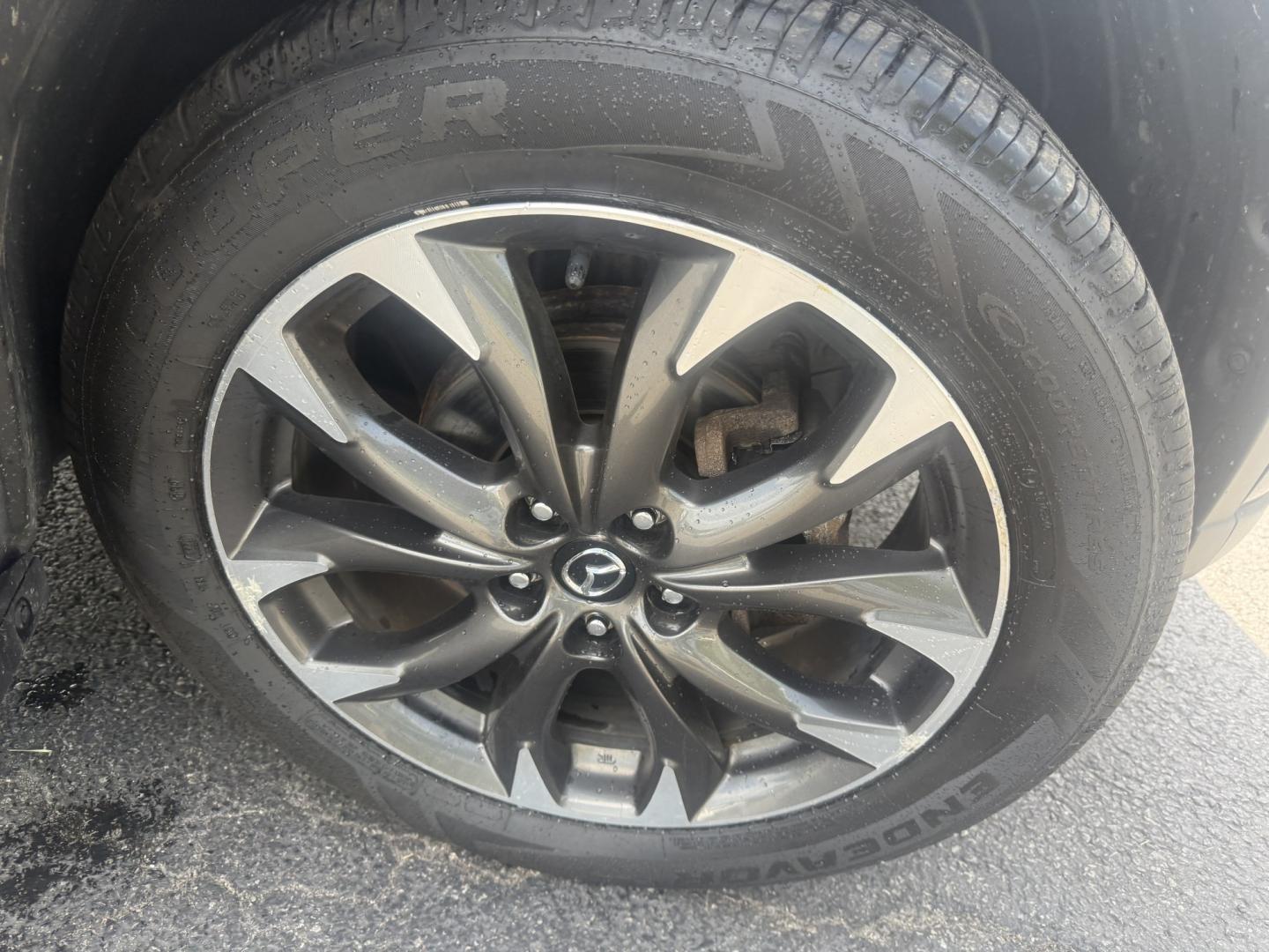 2016 Black /Black Mazda CX-5 Grand Touring AWD (JM3KE4DY6G0) with an 2.5L I4 DOHC 16V engine, Automatic transmission, located at 547 E. Main St., Orwell, OH, 44076, (440) 437-5893, 41.535435, -80.847855 - 2016 Mazda CX-5 Grand Touring AWD – Premium Compact SUV with Leather, BOSE Sound, and Strong Efficiency! This 2016 Mazda CX-5 Grand Touring AWD is a refined and sporty crossover that offers upscale comfort, engaging driving dynamics, and excellent efficiency. Powered by a smooth 2.5L I4 engine pa- Photo#4