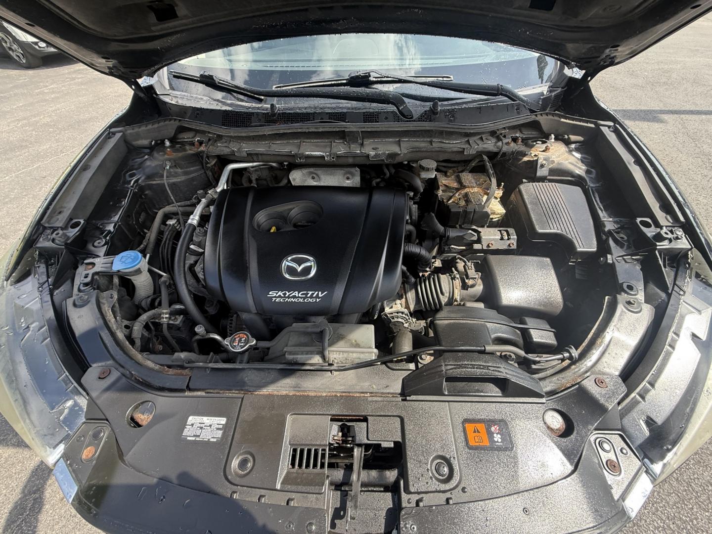 2016 Black /Black Mazda CX-5 Grand Touring AWD (JM3KE4DY6G0) with an 2.5L I4 DOHC 16V engine, Automatic transmission, located at 547 E. Main St., Orwell, OH, 44076, (440) 437-5893, 41.535435, -80.847855 - 2016 Mazda CX-5 Grand Touring AWD – Premium Compact SUV with Leather, BOSE Sound, and Strong Efficiency! This 2016 Mazda CX-5 Grand Touring AWD is a refined and sporty crossover that offers upscale comfort, engaging driving dynamics, and excellent efficiency. Powered by a smooth 2.5L I4 engine pa- Photo#5