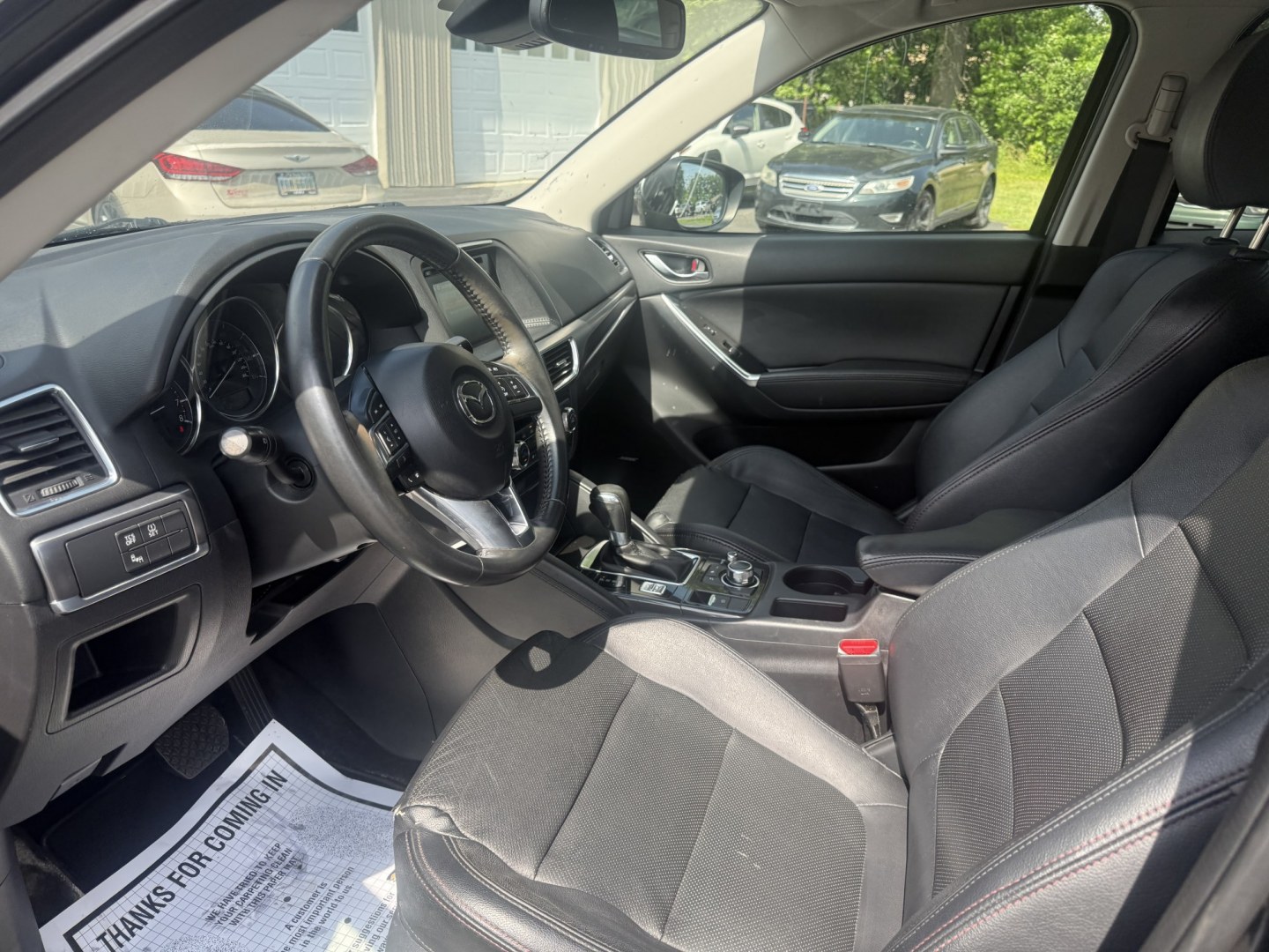 2016 Black /Black Mazda CX-5 Grand Touring AWD (JM3KE4DY6G0) with an 2.5L I4 DOHC 16V engine, Automatic transmission, located at 547 E. Main St., Orwell, OH, 44076, (440) 437-5893, 41.535435, -80.847855 - 2016 Mazda CX-5 Grand Touring AWD – Premium Compact SUV with Leather, BOSE Sound, and Strong Efficiency! This 2016 Mazda CX-5 Grand Touring AWD is a refined and sporty crossover that offers upscale comfort, engaging driving dynamics, and excellent efficiency. Powered by a smooth 2.5L I4 engine pa- Photo#6