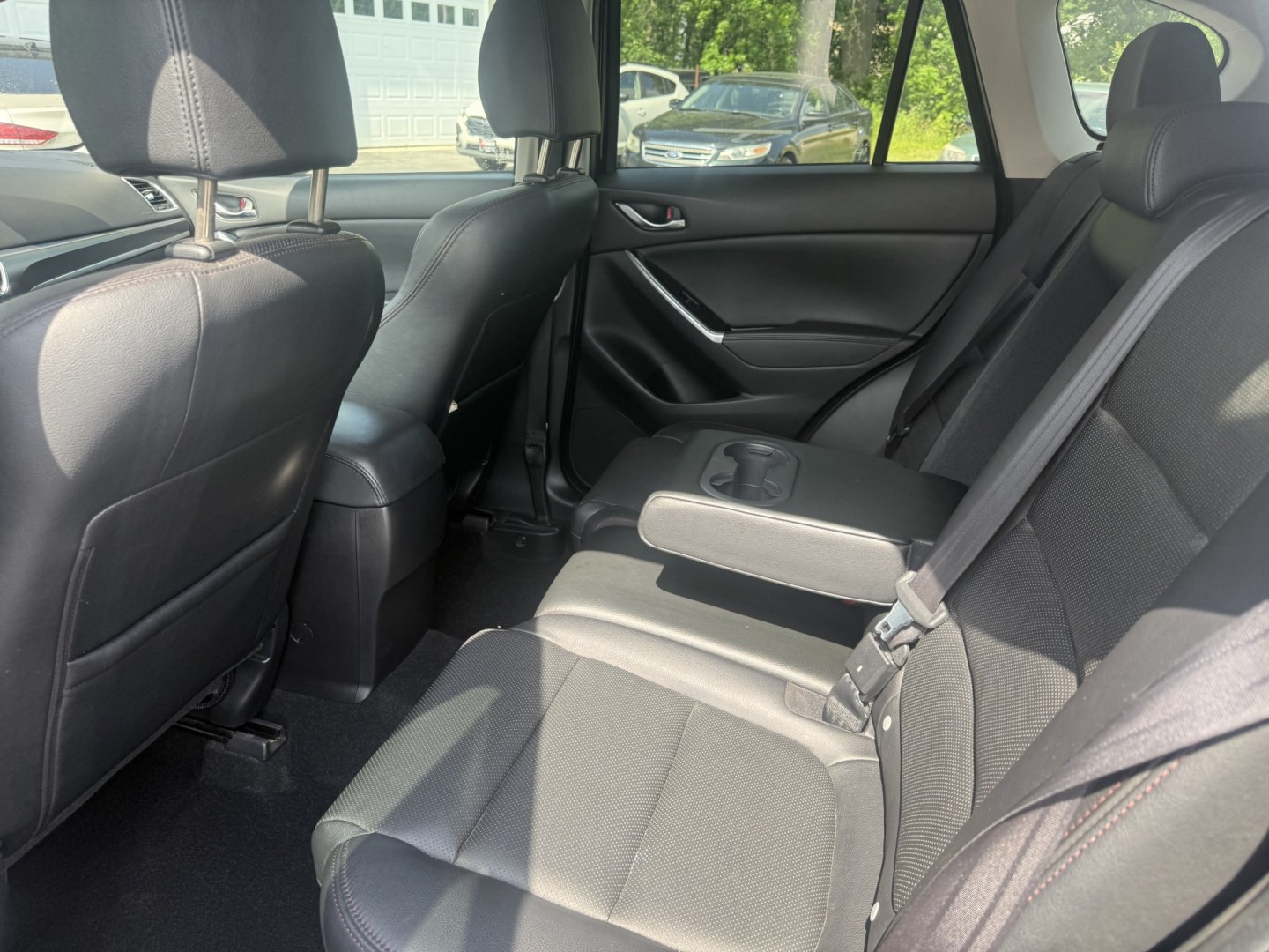 2016 Black /Black Mazda CX-5 Grand Touring AWD (JM3KE4DY6G0) with an 2.5L I4 DOHC 16V engine, Automatic transmission, located at 547 E. Main St., Orwell, OH, 44076, (440) 437-5893, 41.535435, -80.847855 - 2016 Mazda CX-5 Grand Touring AWD – Premium Compact SUV with Leather, BOSE Sound, and Strong Efficiency! This 2016 Mazda CX-5 Grand Touring AWD is a refined and sporty crossover that offers upscale comfort, engaging driving dynamics, and excellent efficiency. Powered by a smooth 2.5L I4 engine pa- Photo#23