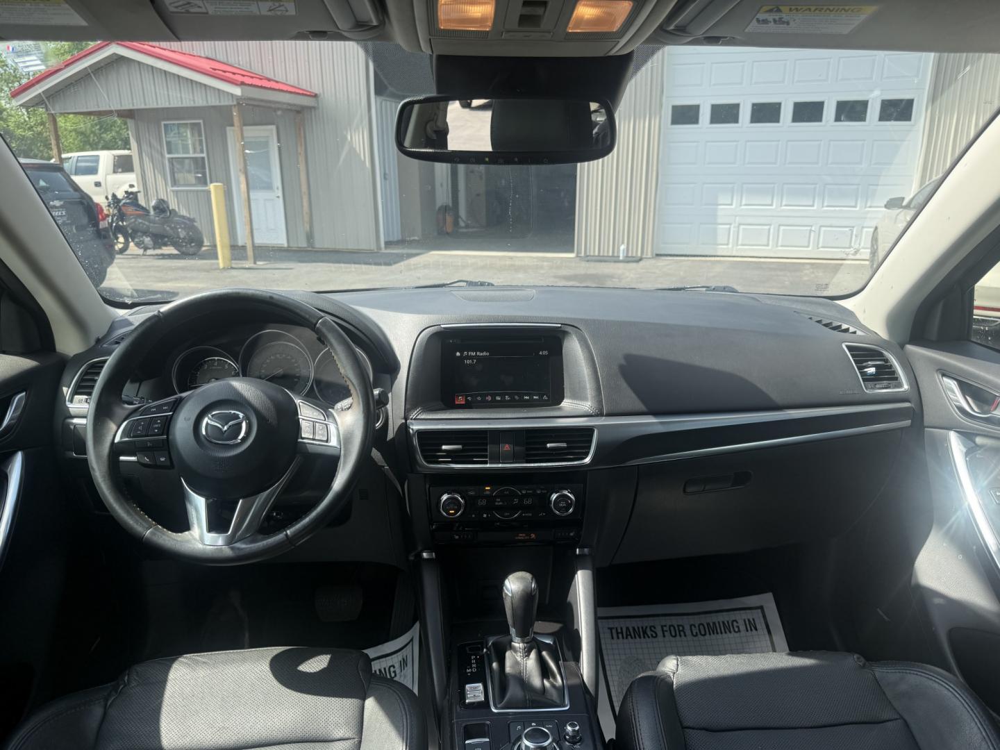 2016 Black /Black Mazda CX-5 Grand Touring AWD (JM3KE4DY6G0) with an 2.5L I4 DOHC 16V engine, Automatic transmission, located at 547 E. Main St., Orwell, OH, 44076, (440) 437-5893, 41.535435, -80.847855 - 2016 Mazda CX-5 Grand Touring AWD – Premium Compact SUV with Leather, BOSE Sound, and Strong Efficiency! This 2016 Mazda CX-5 Grand Touring AWD is a refined and sporty crossover that offers upscale comfort, engaging driving dynamics, and excellent efficiency. Powered by a smooth 2.5L I4 engine pa- Photo#24