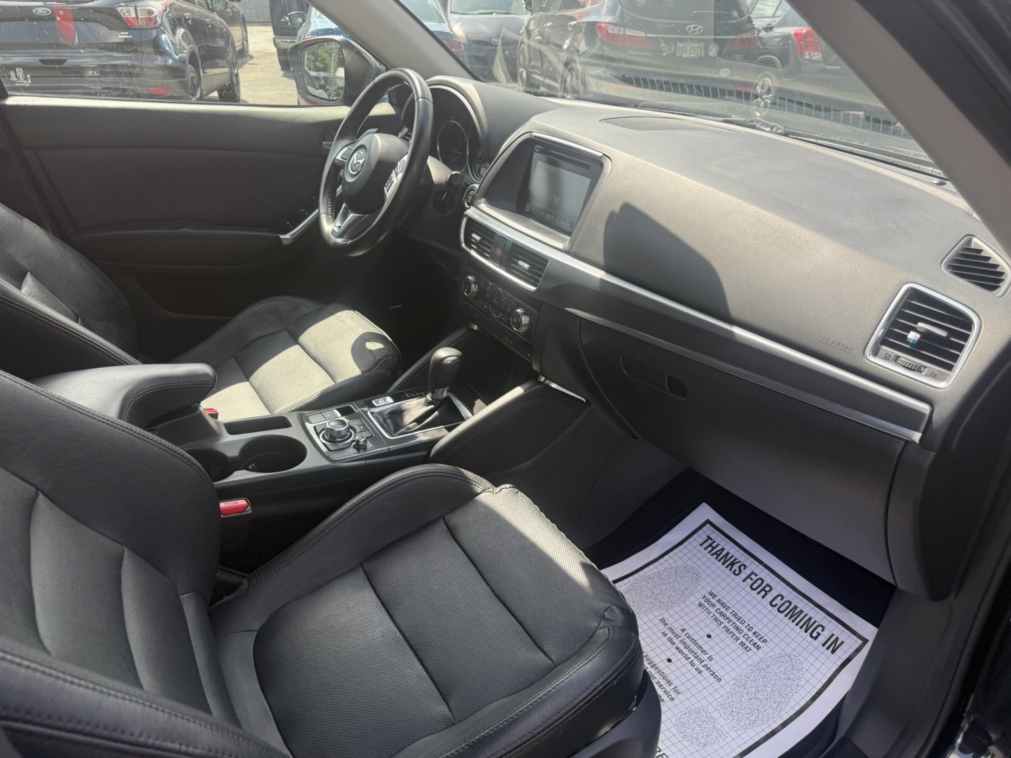 2016 Black /Black Mazda CX-5 Grand Touring AWD (JM3KE4DY6G0) with an 2.5L I4 DOHC 16V engine, Automatic transmission, located at 547 E. Main St., Orwell, OH, 44076, (440) 437-5893, 41.535435, -80.847855 - 2016 Mazda CX-5 Grand Touring AWD – Premium Compact SUV with Leather, BOSE Sound, and Strong Efficiency! This 2016 Mazda CX-5 Grand Touring AWD is a refined and sporty crossover that offers upscale comfort, engaging driving dynamics, and excellent efficiency. Powered by a smooth 2.5L I4 engine pa- Photo#39