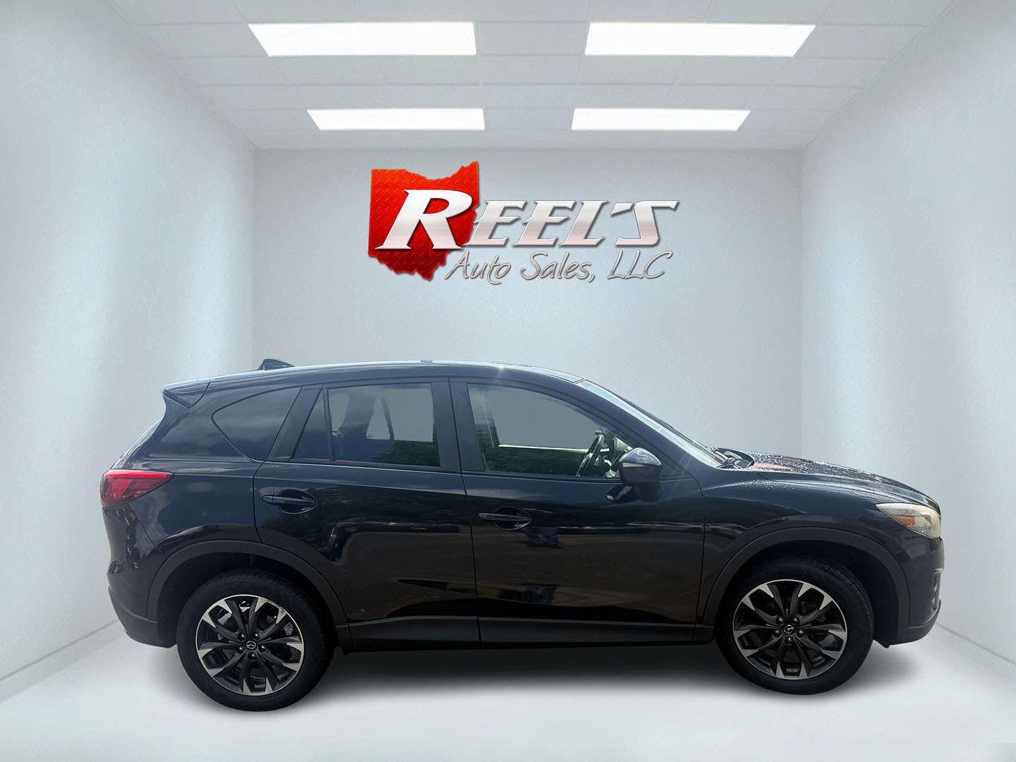 2016 Black /Black Mazda CX-5 Grand Touring AWD (JM3KE4DY6G0) with an 2.5L I4 DOHC 16V engine, Automatic transmission, located at 547 E. Main St., Orwell, OH, 44076, (440) 437-5893, 41.535435, -80.847855 - 2016 Mazda CX-5 Grand Touring AWD – Premium Compact SUV with Leather, BOSE Sound, and Strong Efficiency! This 2016 Mazda CX-5 Grand Touring AWD is a refined and sporty crossover that offers upscale comfort, engaging driving dynamics, and excellent efficiency. Powered by a smooth 2.5L I4 engine pa- Photo#26