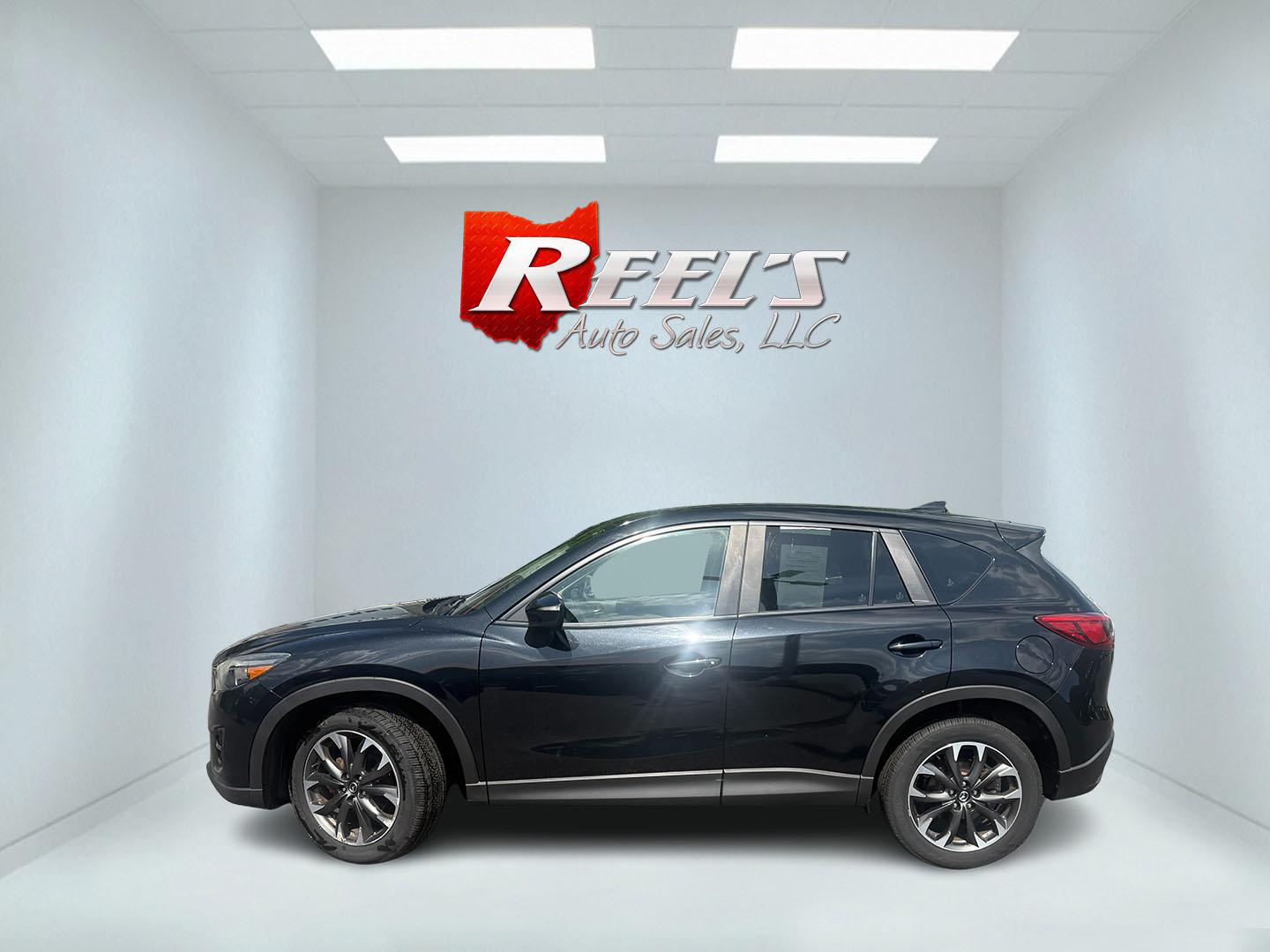 2016 Black /Black Mazda CX-5 Grand Touring AWD (JM3KE4DY6G0) with an 2.5L I4 DOHC 16V engine, Automatic transmission, located at 547 E. Main St., Orwell, OH, 44076, (440) 437-5893, 41.535435, -80.847855 - 2016 Mazda CX-5 Grand Touring AWD – Premium Compact SUV with Leather, BOSE Sound, and Strong Efficiency! This 2016 Mazda CX-5 Grand Touring AWD is a refined and sporty crossover that offers upscale comfort, engaging driving dynamics, and excellent efficiency. Powered by a smooth 2.5L I4 engine pa- Photo#33